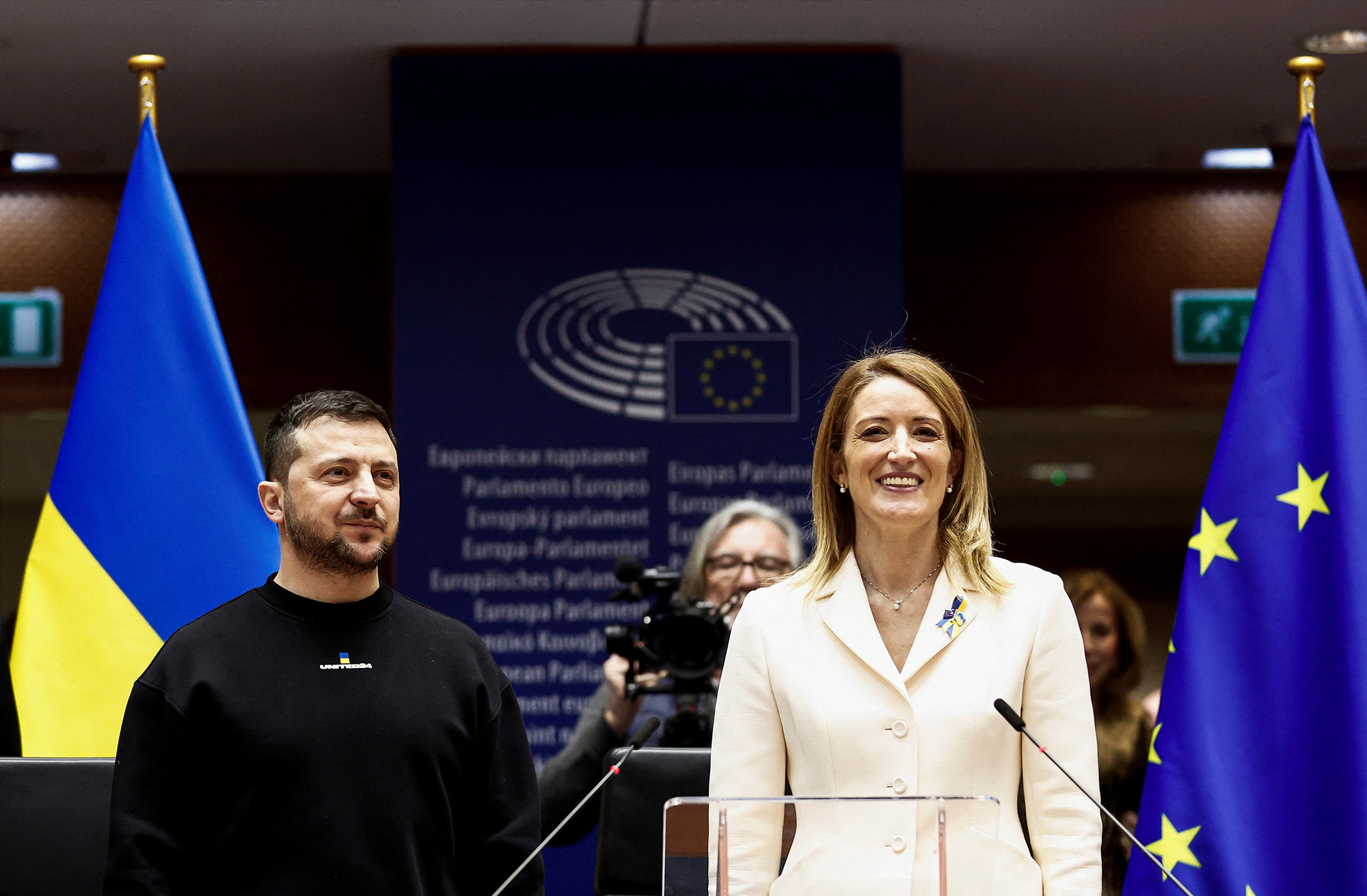Ukraine's president Volodymyr Zelensky, left, poses next to European Parliament President Roberta Metsola as he arrives for a summit at EU parliament in Brussels, Belgium, on February 9.
