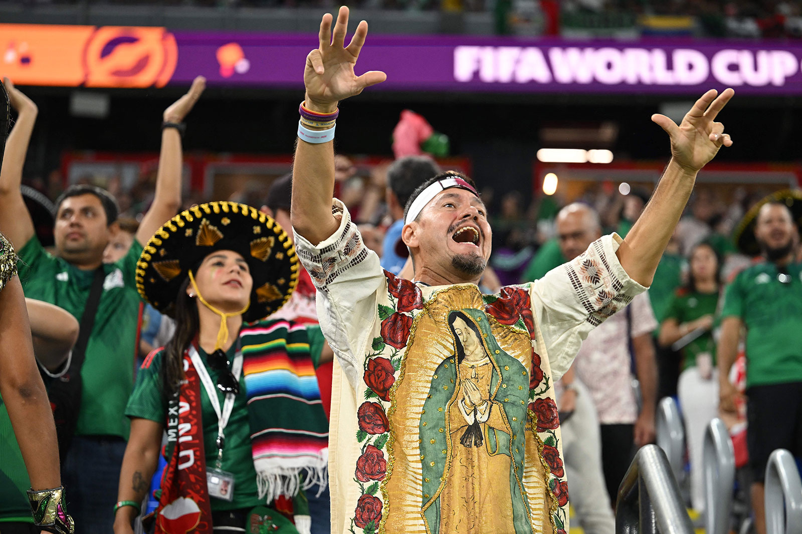 Fans of Mexico cheer in the stands ahead of match between Mexico and Poland on November 22.