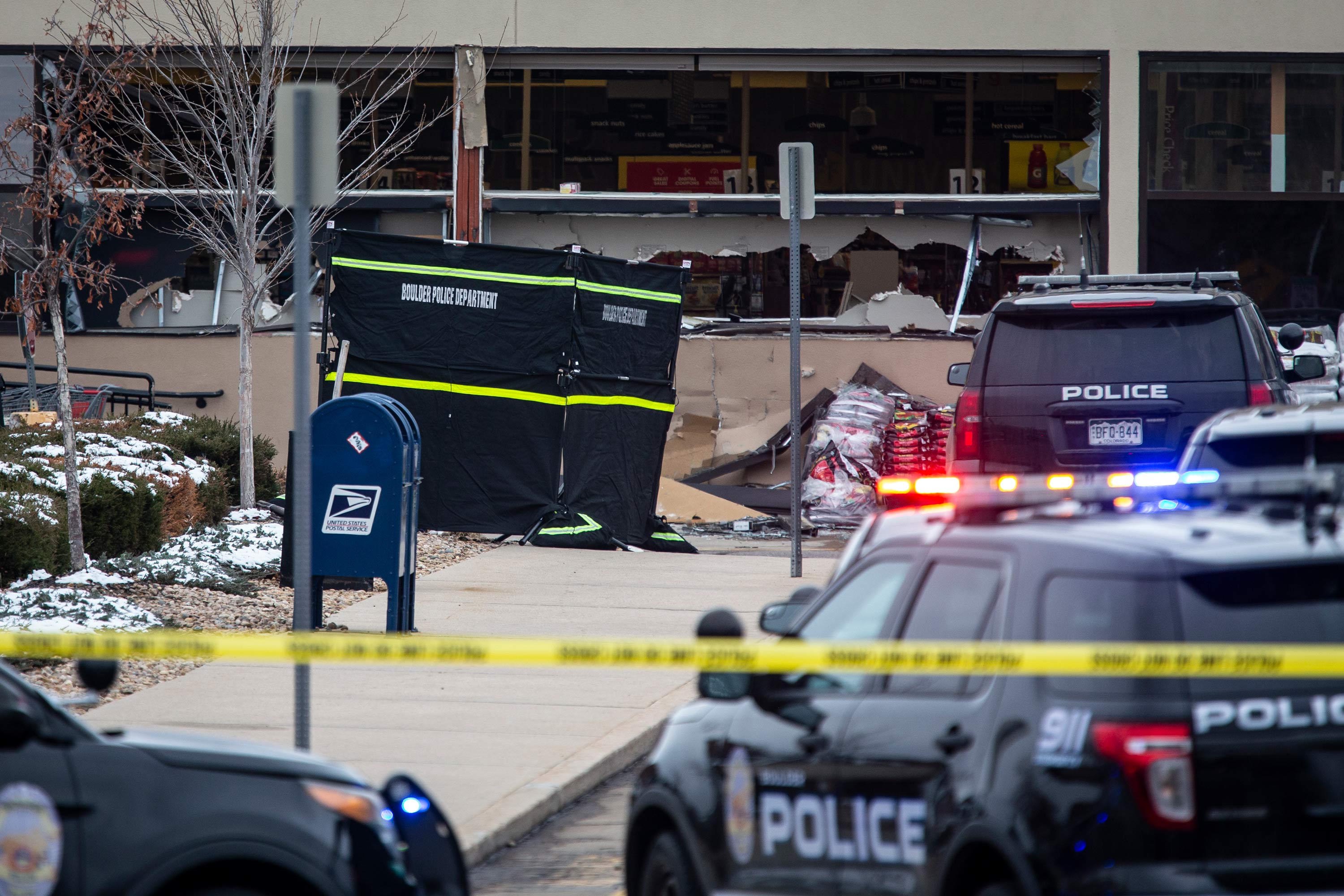 Police respond after a gunman opened fire at a King Sooper's grocery store on March 22 in Boulder, Colorado. 