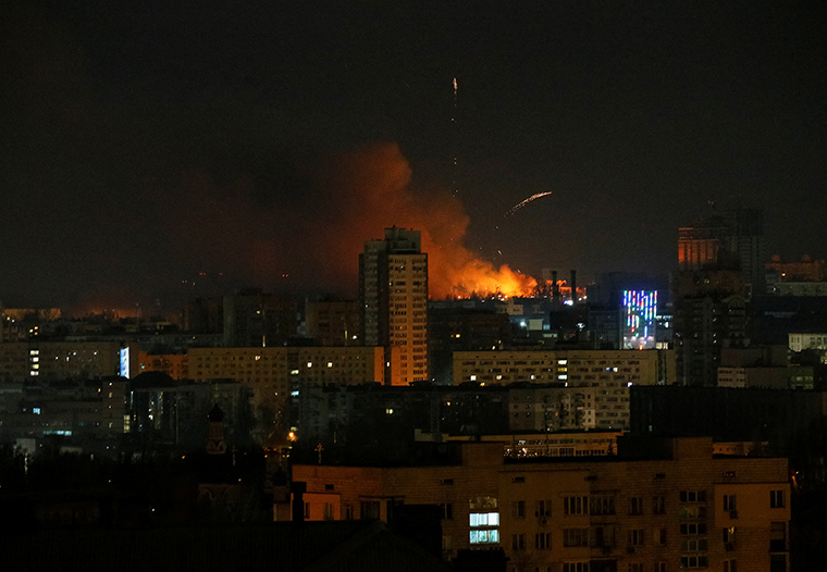 Smoke and flames rise over during the shelling near Kyiv, as Russia continues its invasion of Ukraine February 26.