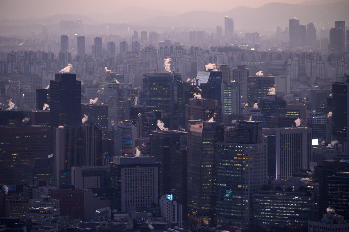  A general view shows the Seoul city skyline and landmark Namsan tower early on December 16.