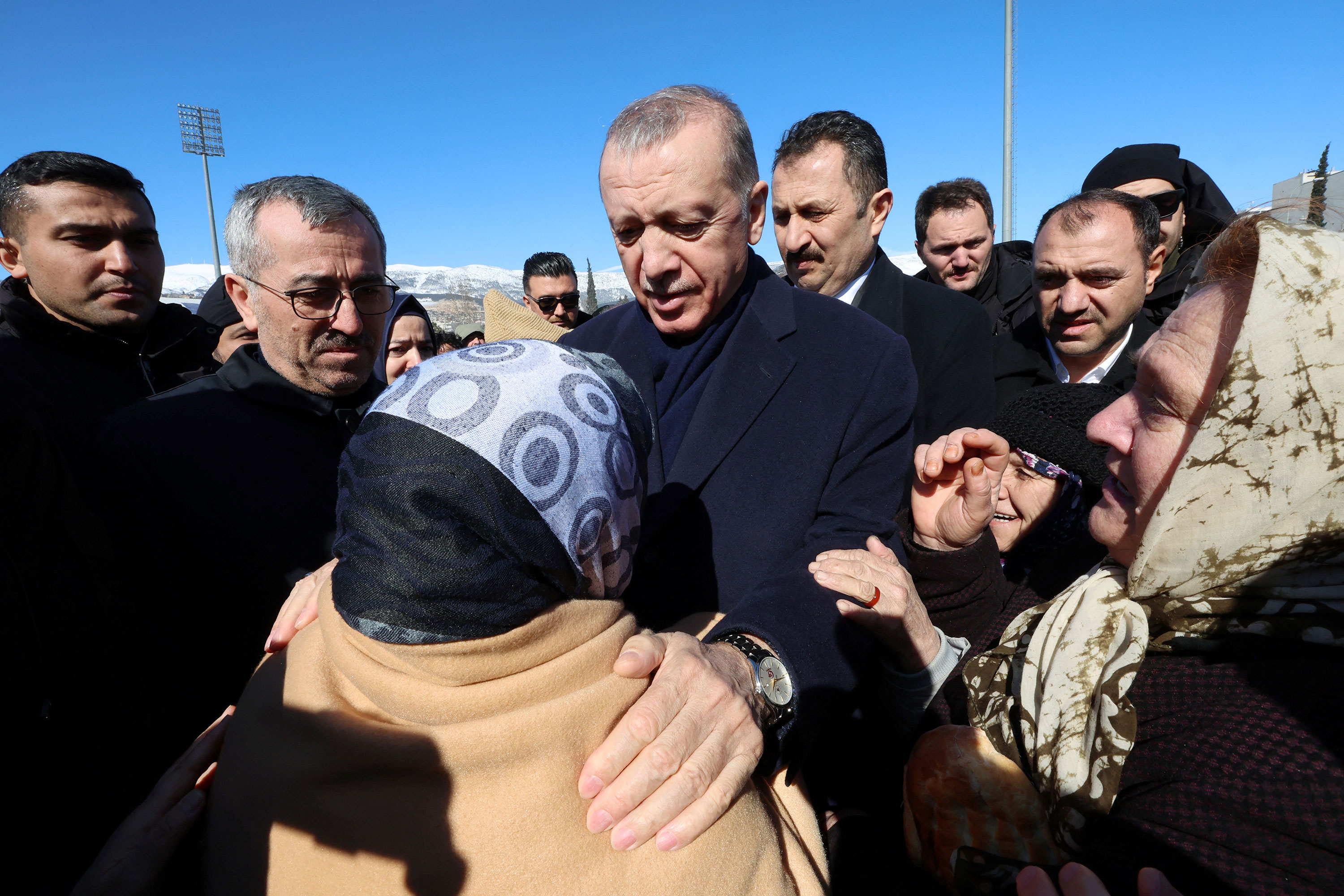 Turkish President Recep Tayyip Erdogan meets with survivors in Kahramanmaras, Turkey, on Wednesday.