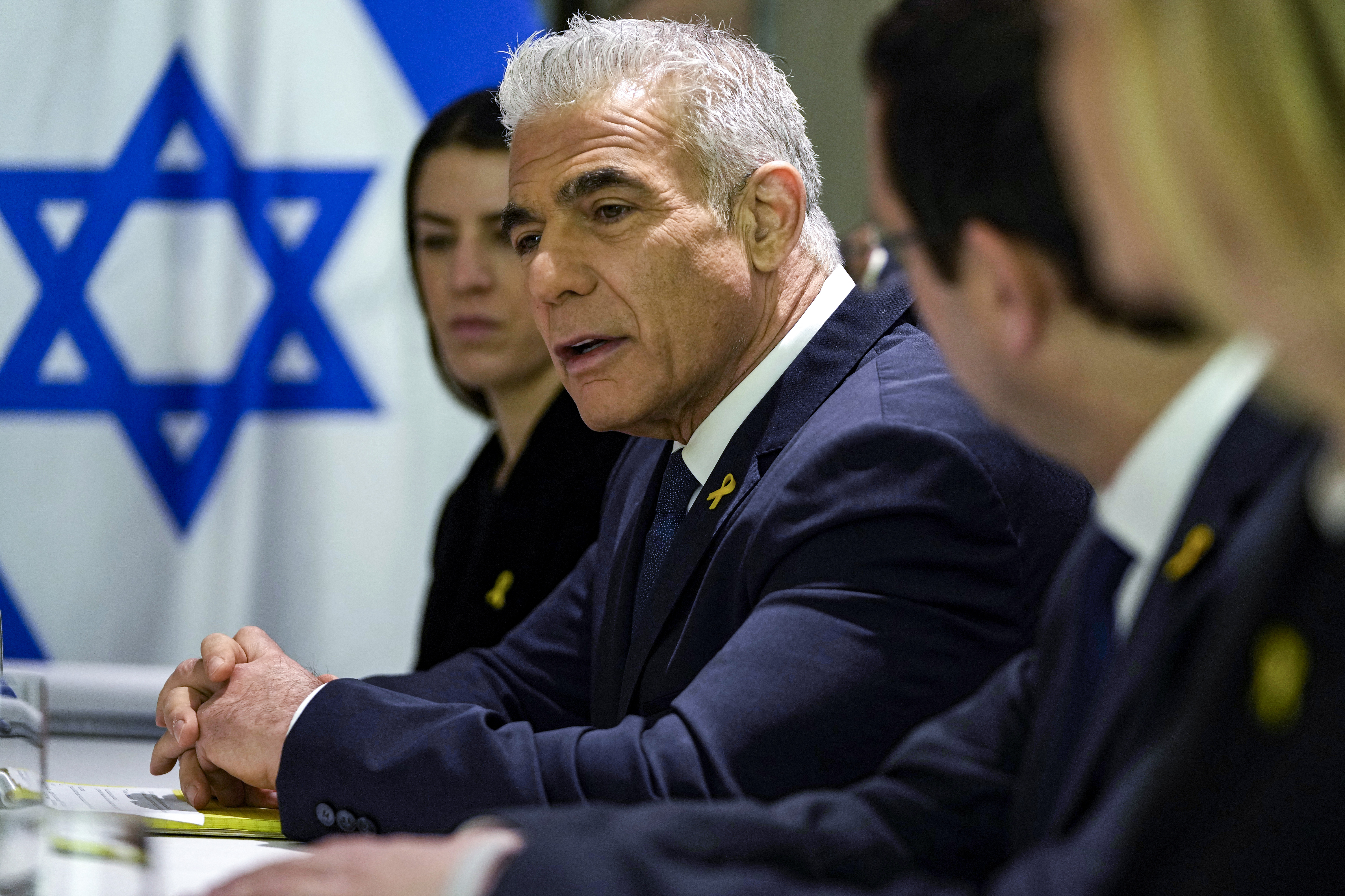 Israeli opposition leader Yair Lapid meets with United States officials, not pictured, in Tel Aviv, Israel, on February 8, 2024.