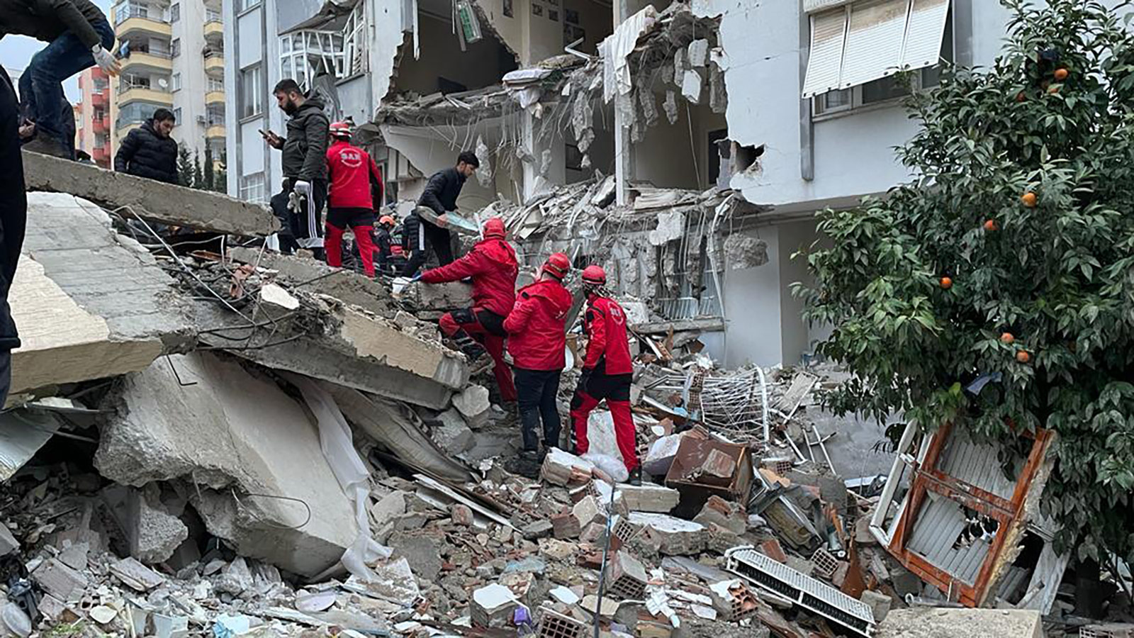 Rescue workers search through debris in Kahramanmaras, Turkey on Monday. 