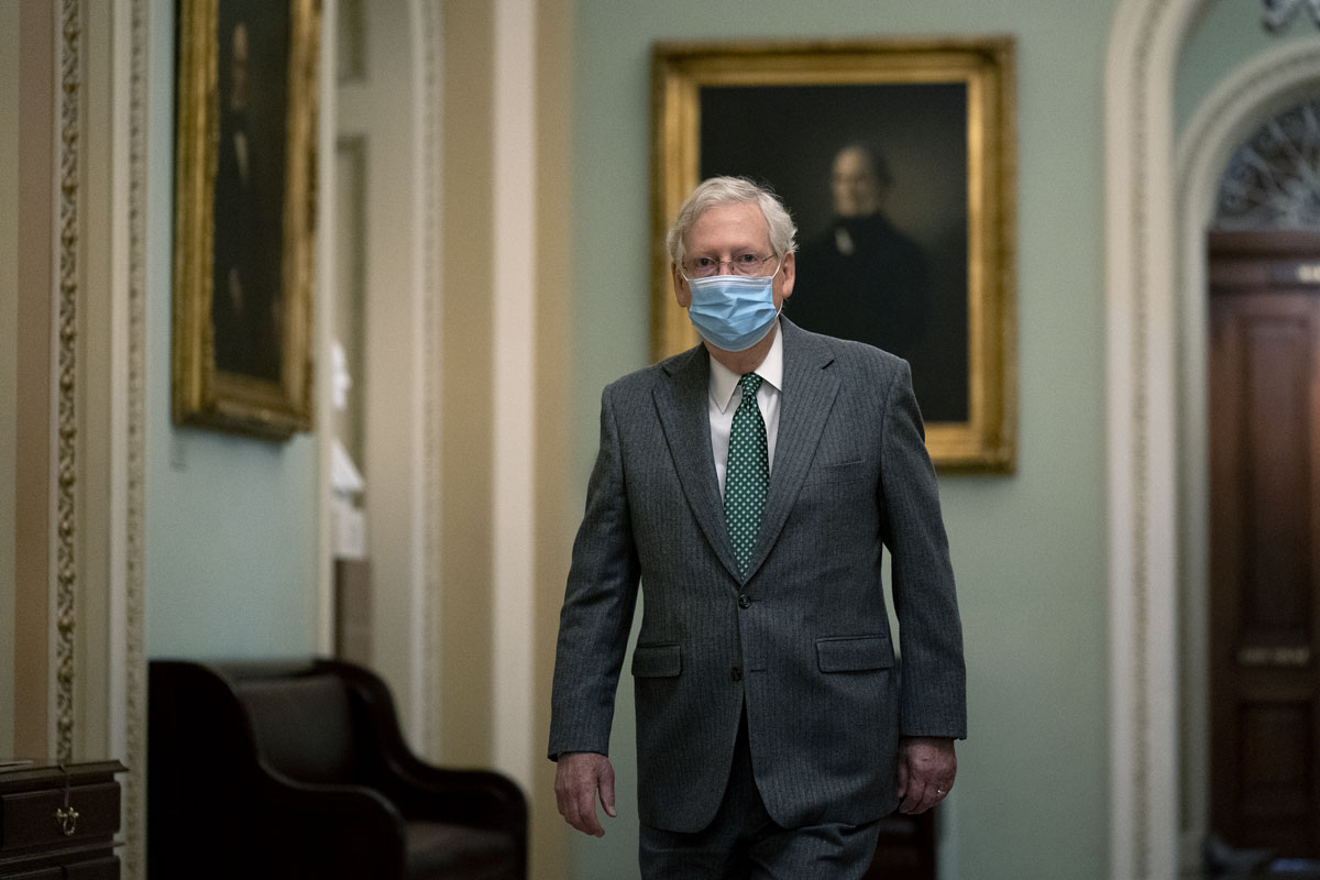 Senate Majority Leader Mitch McConnell walks to the Senate Floor at the U.S. Capitol in Washington, D.C. on Thursday, December 3.