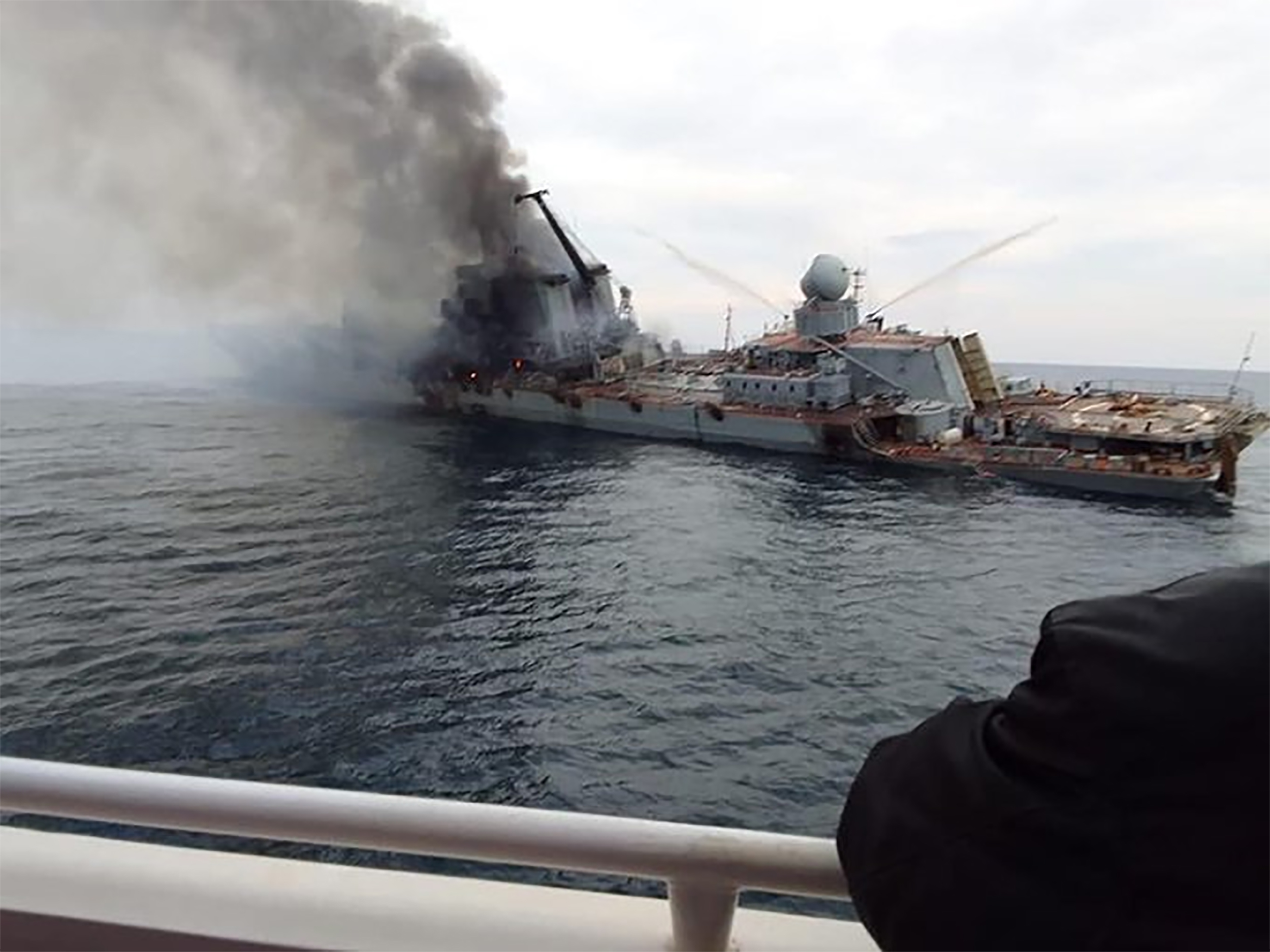 Images emerged early Monday, April 18, on social media showing Russia's guided-missile cruiser, the Moskva, badly damaged and on fire in the hours before the ship sunk in the Black Sea on April 14.