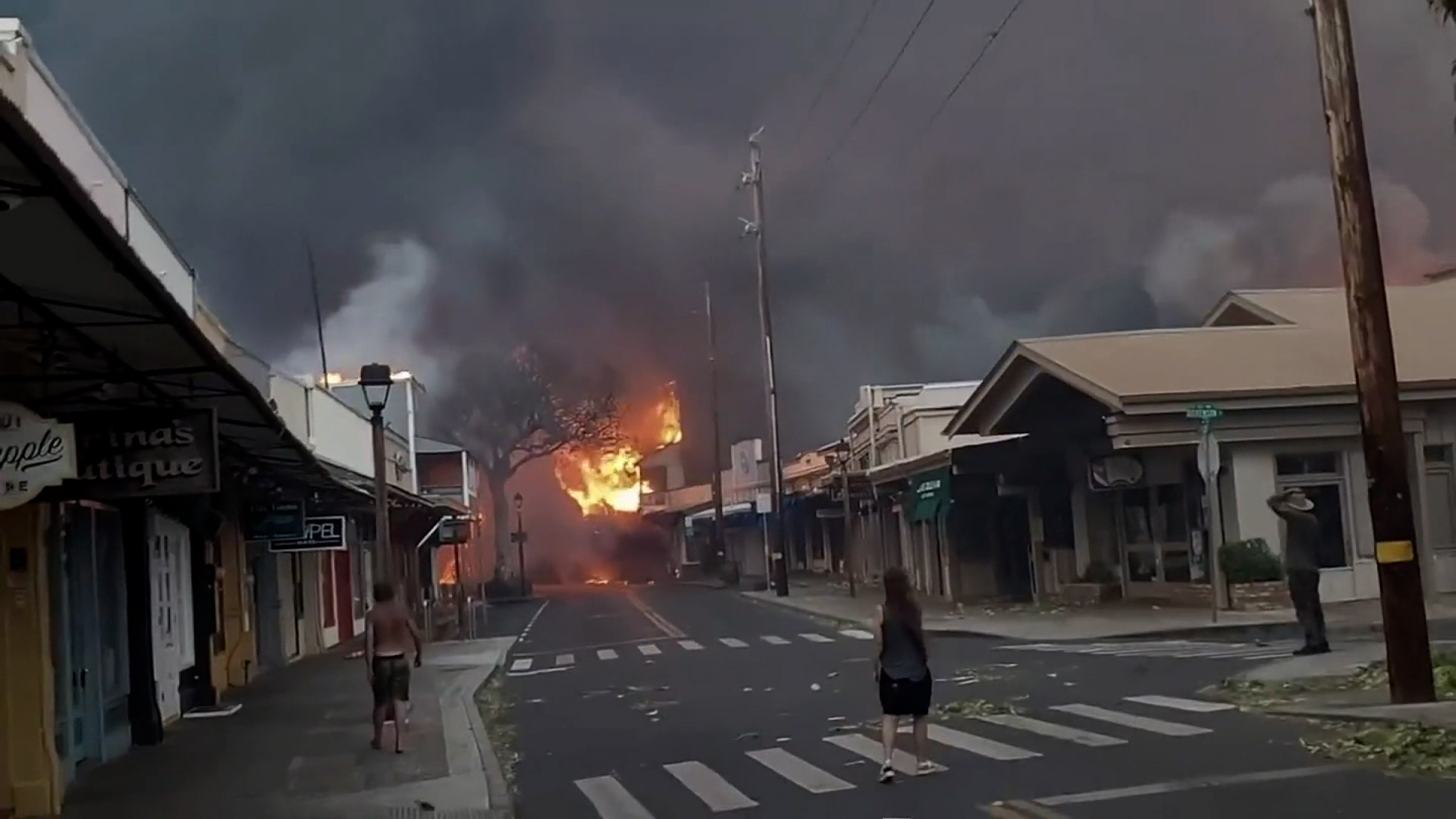 Buildings are seen on fire in Lahaina, Maui, on Wednesday.