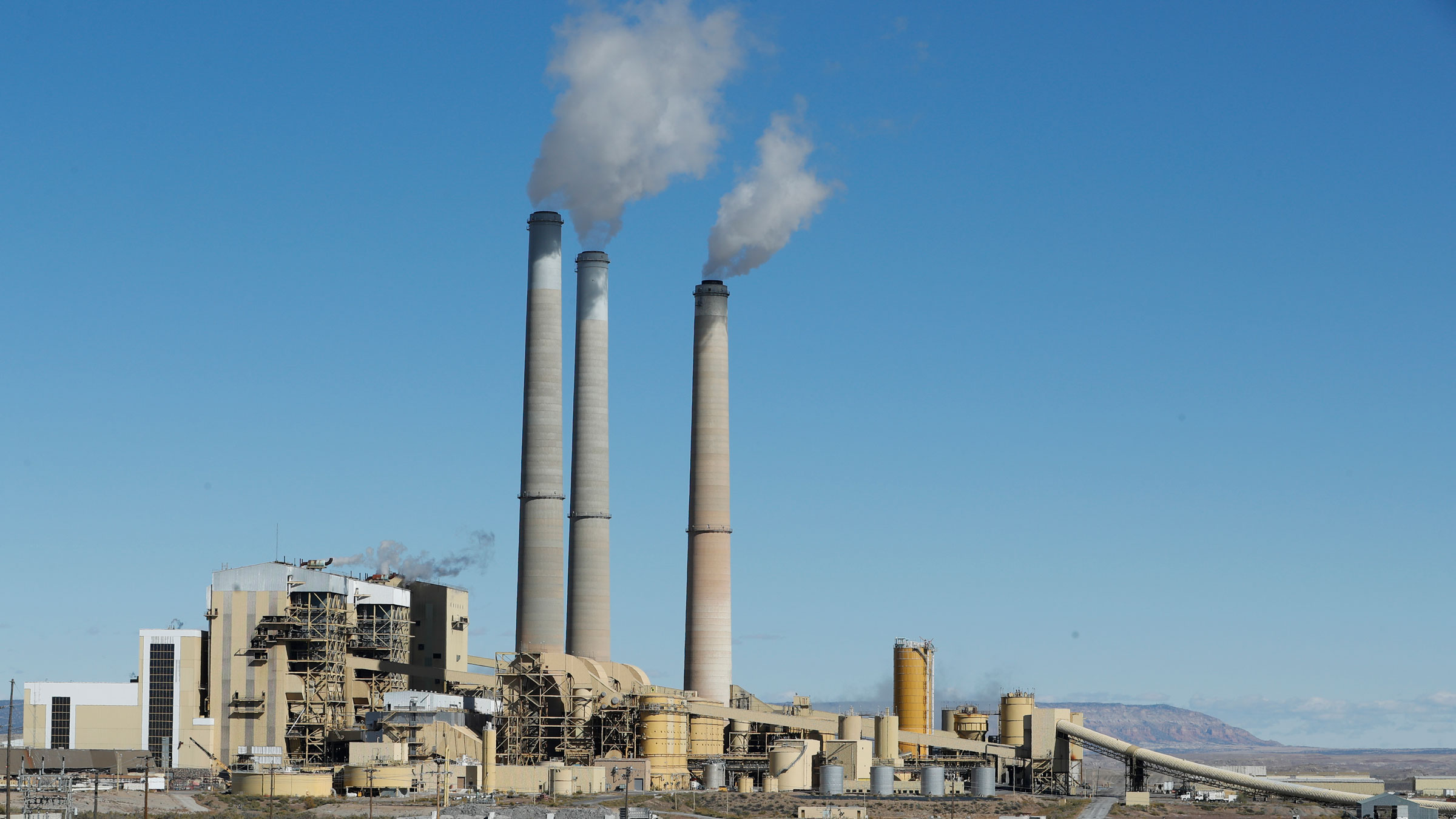 Emissions rise from the smokestacks of a coal-fired power plant in Castle Dale, Utah.