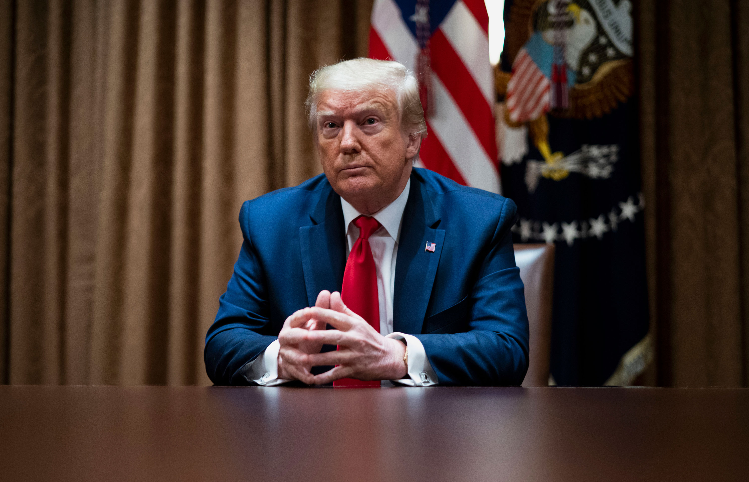 U.S. President Donald Trump holds a meeting at the White House on June 10 in Washington.