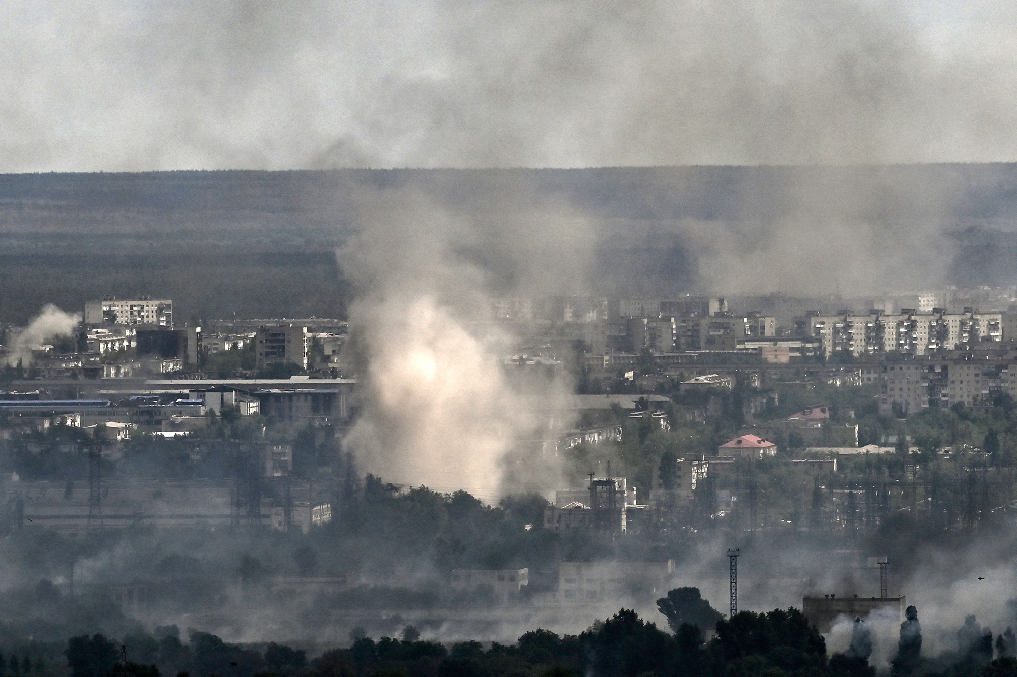 Smoke and dirt rise from shelling in the city of Severodonetsk in the eastern Ukrainian region of Donbas on June 7.