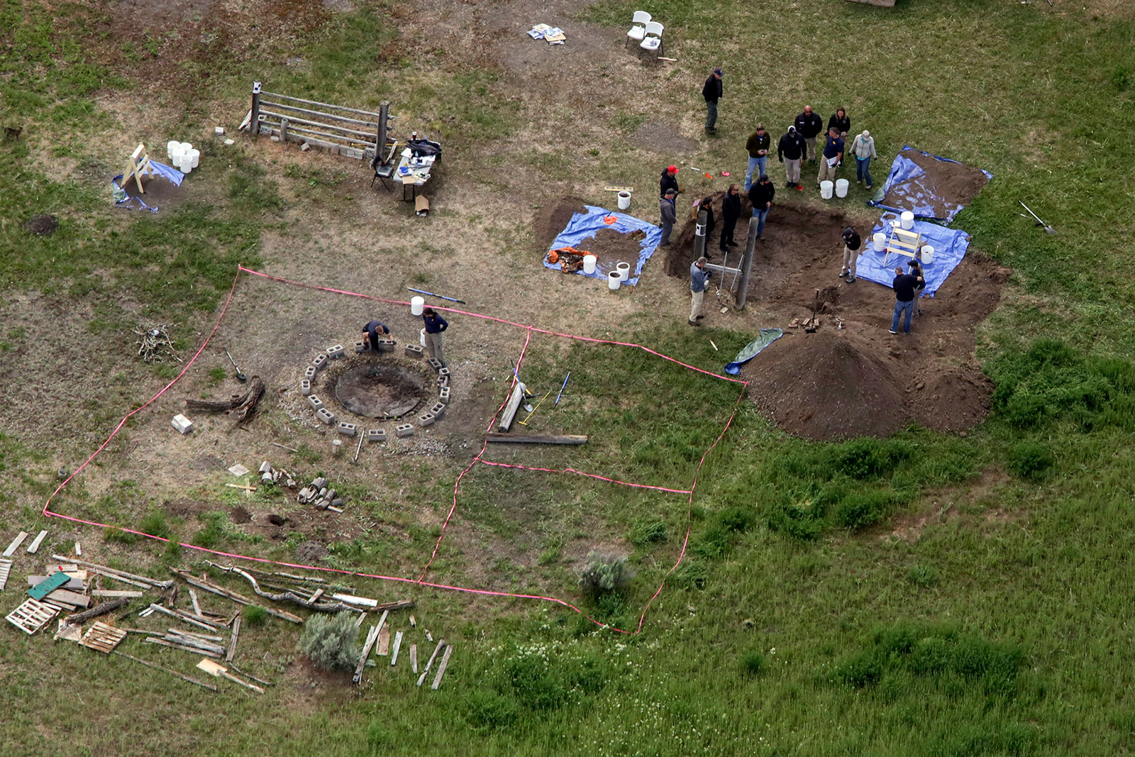 Investigators search for human remains at Chad Daybell's residence in Salem, Idaho, on June 9, 2020.