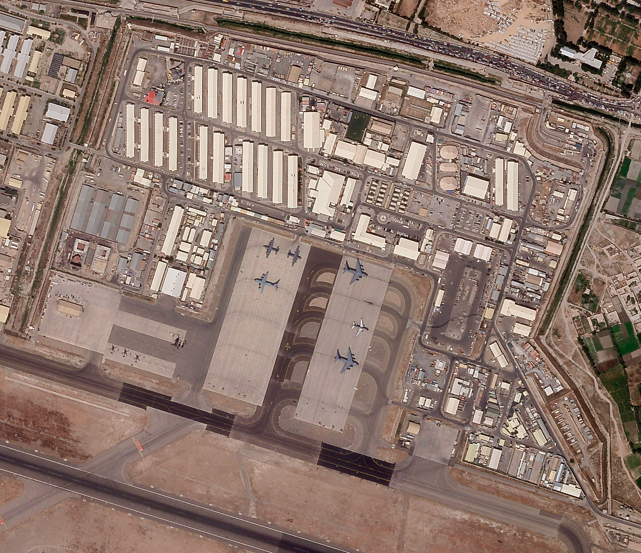 This satellite photo provided by Planet Labs shows the military side of Hamid Karzai International Airport in Kabul, Afghanistan, on August 17, 2021.