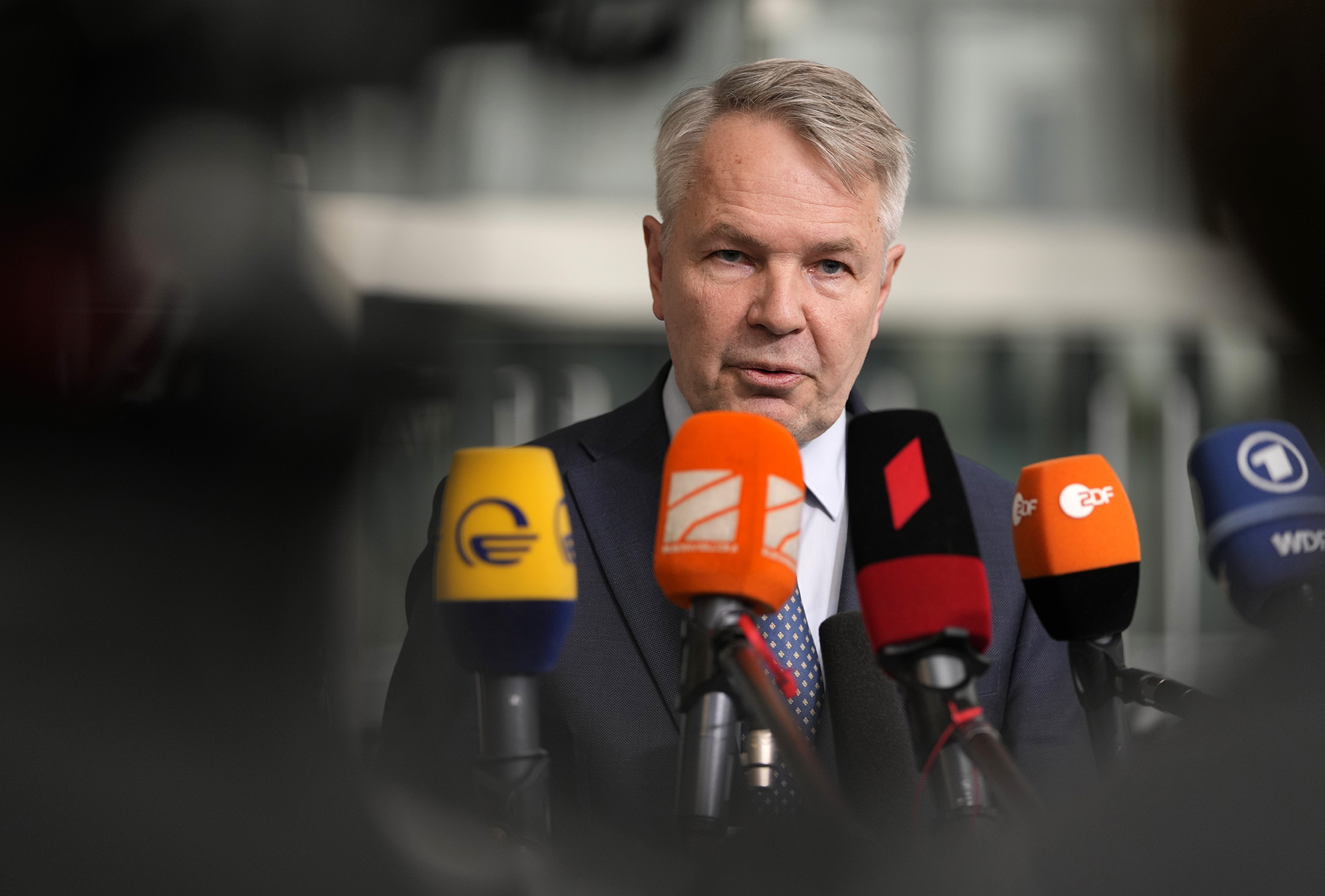 Finland's Foreign Minister Pekka Haavisto speaks with the media as he arrives for a meeting of NATO foreign ministers at NATO headquarters in Brussels, Belgium, on April 6.