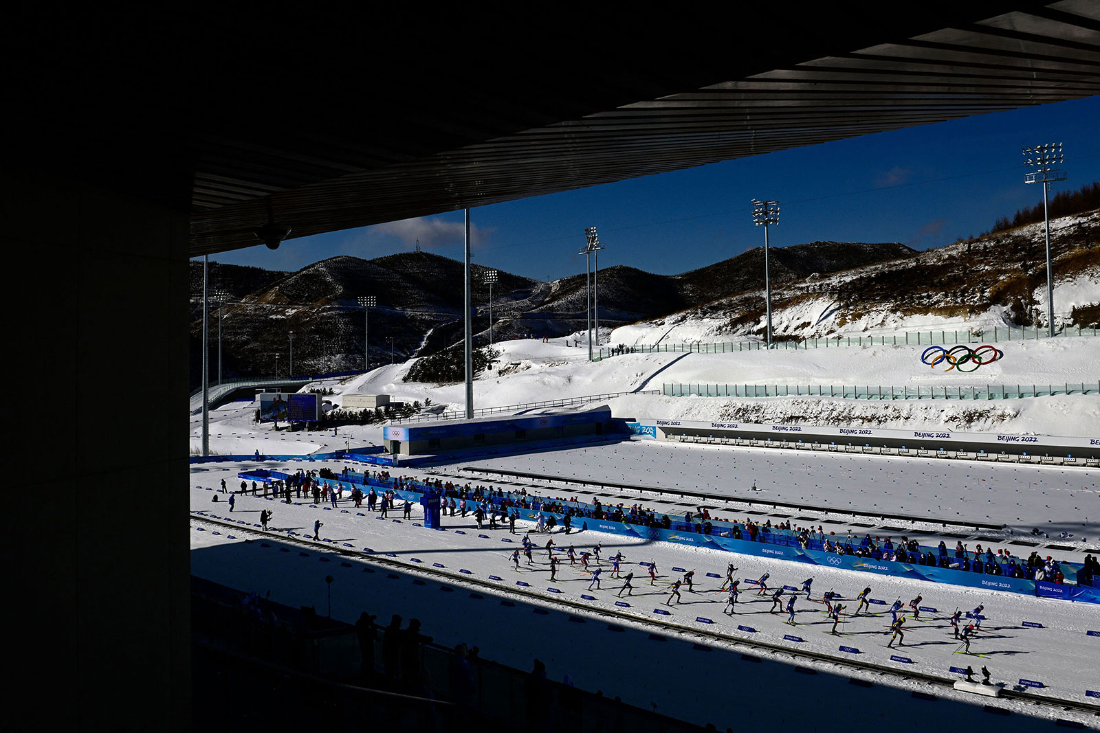Athletes compete in the women's 12.5km biathlon mass start event on February 18.