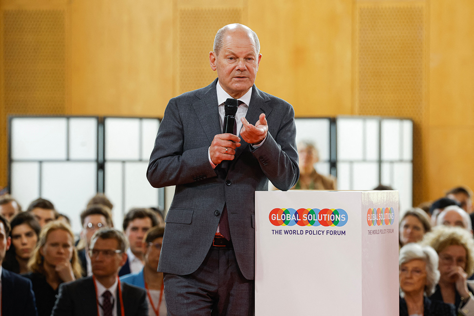 German Chancellor Olaf Scholz speaks on stage during the Global Solutions Summit in Berlin, on May 15.