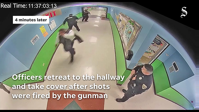 New video show officers inside Uvalde school retreated immediately after taking gunfire