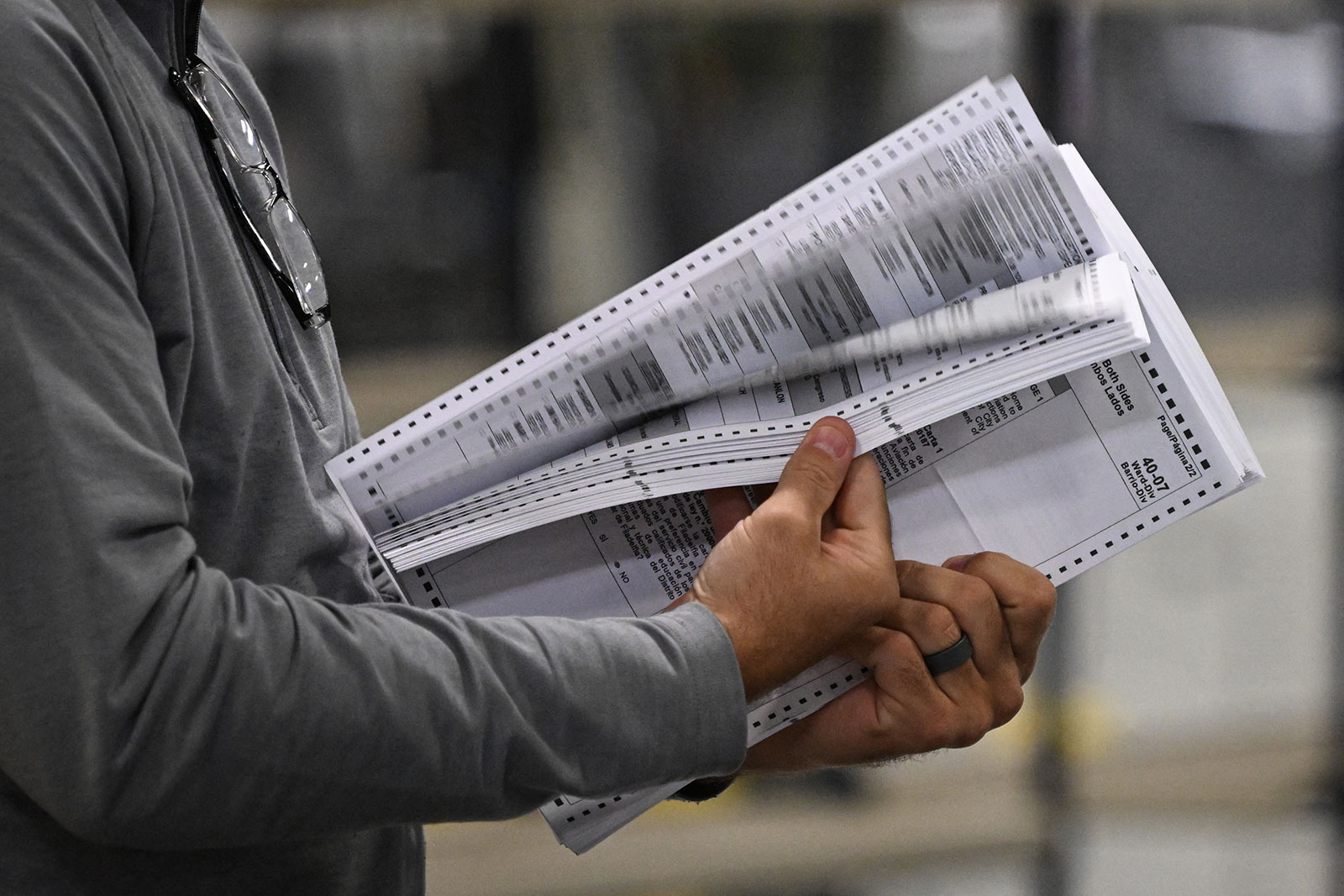 Poll workers process ballots at an elections warehouse outside of Philadelphia on November 8. 
