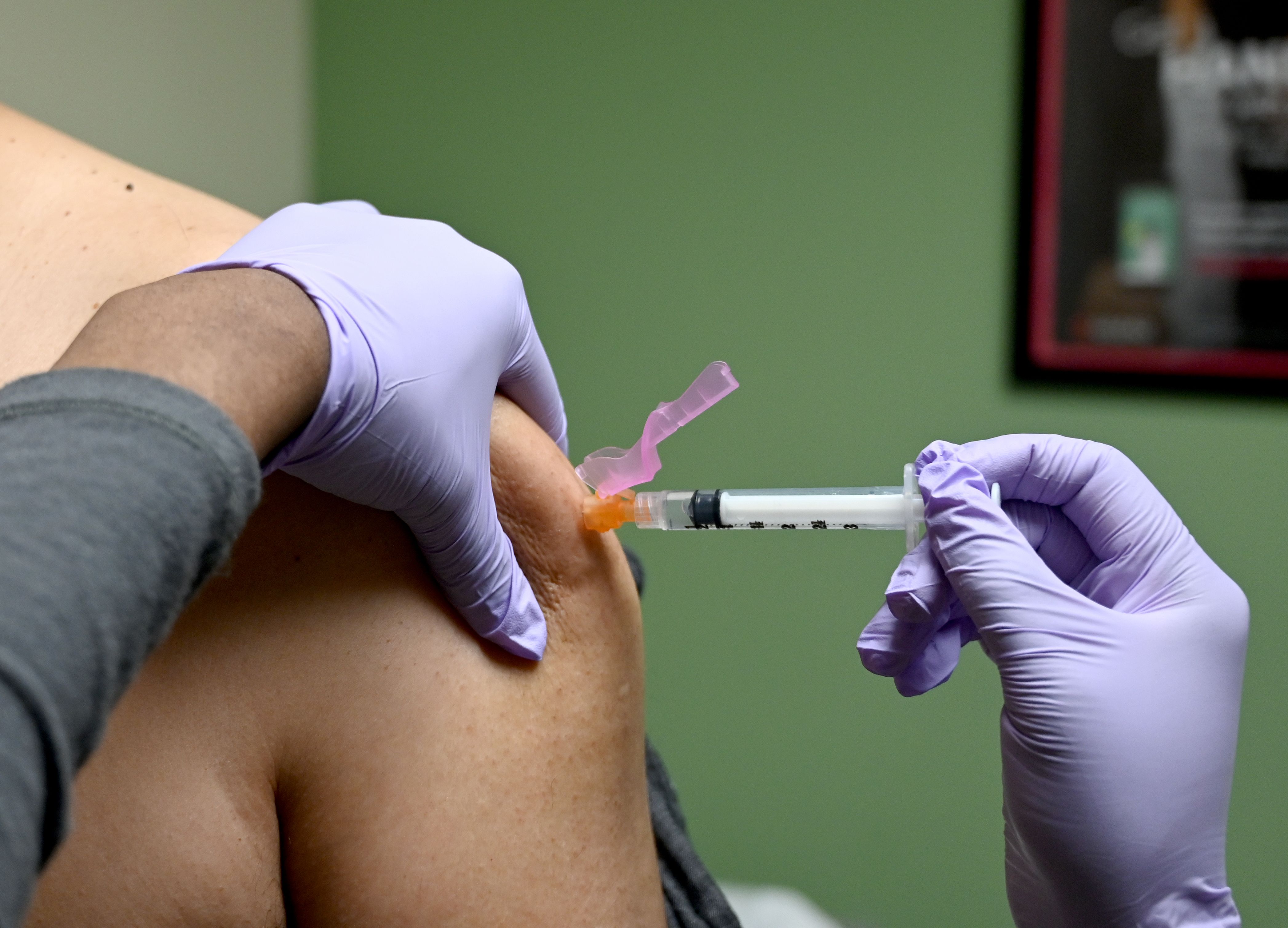 A person gets a flu shot in Washington, DC, on January 31.