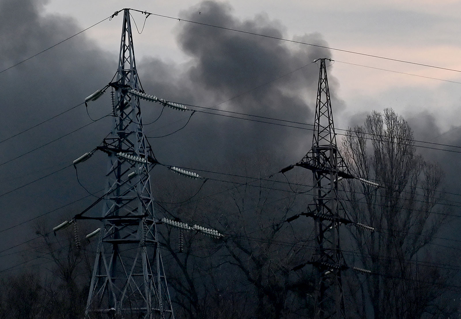 Smoke billows near electricity towers after a Russian missile strike in Kyiv on March 9. 