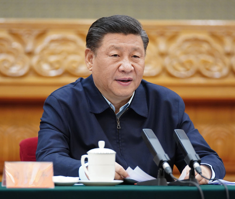 In this photo released by state-run Xinhua News Agency, Chinese President Xi Jinping delivers a speech at a symposium on poverty alleviation in Beijing on March 6. 
