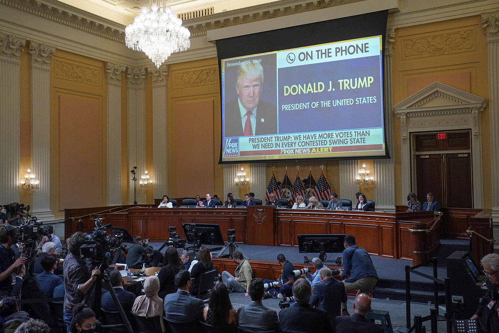An image of former President Donald Trump phoning into a Fox News interview is shown on a screen during Thursday's U.S. House Select Committee hearing in Washington, D.C.