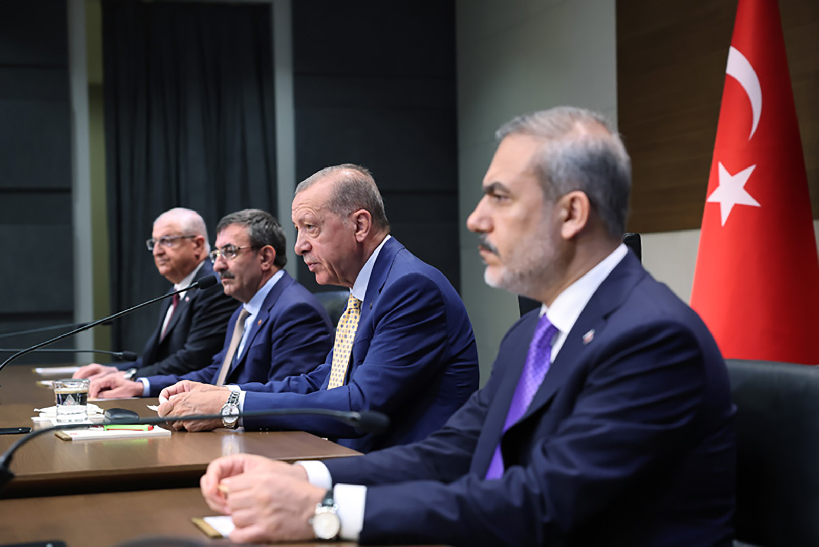 Turkish President Recep Tayyip Erdogan, second right, speaks during a press conference at Ataturk Airport in Istanbul, Turkey, on July 10.