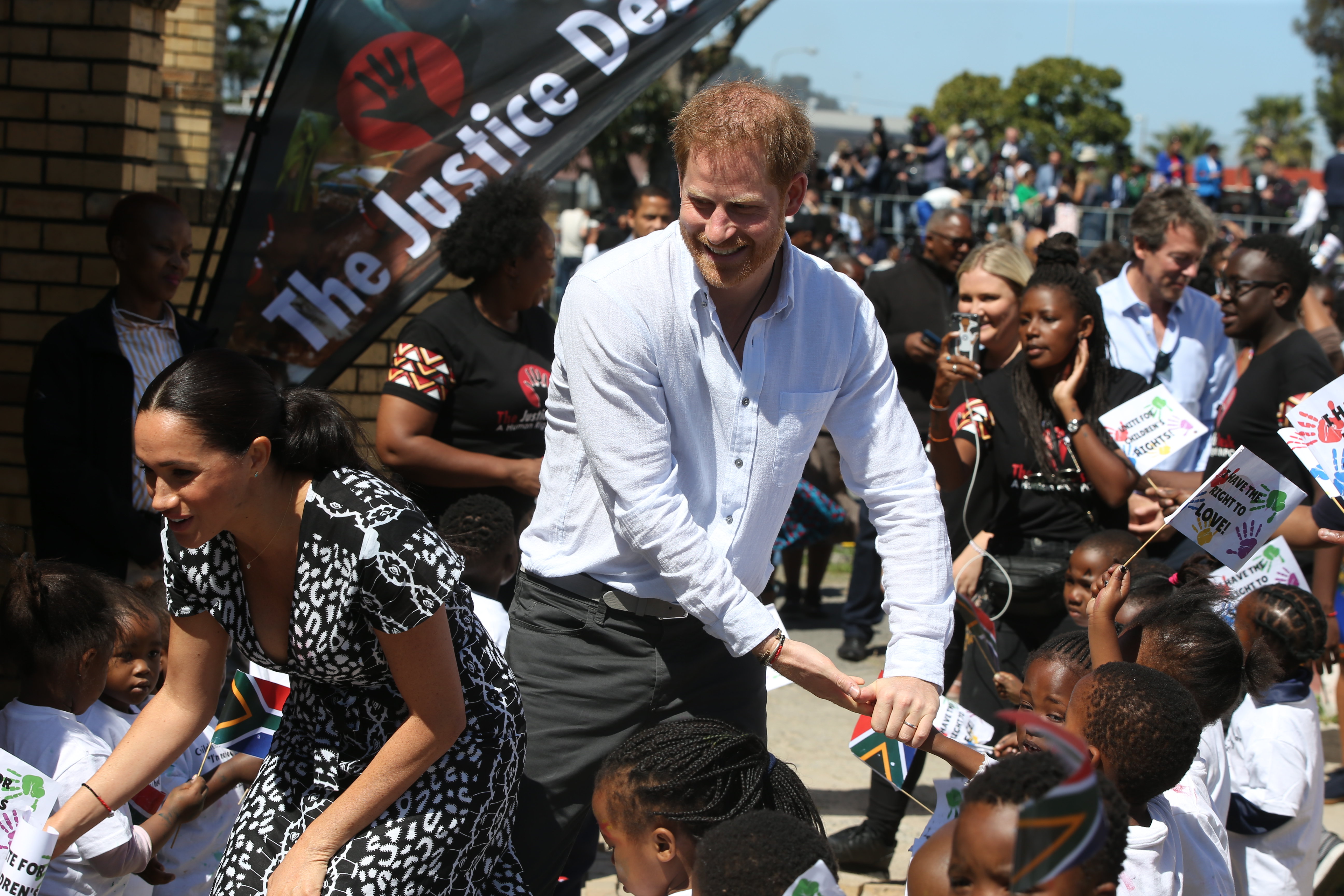 Meghan, Duchess of Sussex and Prince Harry, Duke of Sussex meet well-wishers during a visit to The Justice Desk. Source: Getty Images.