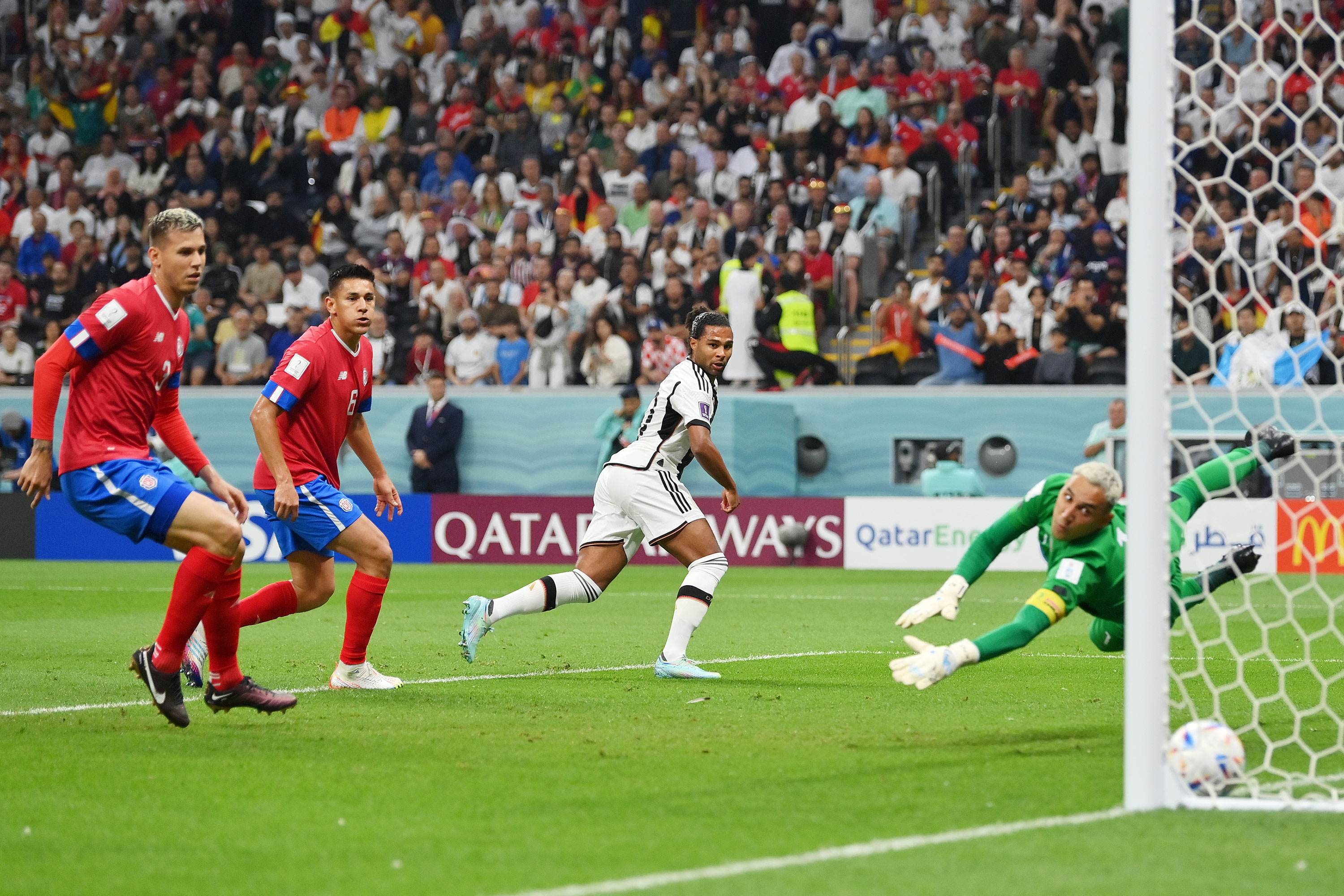 Germany's Serge Gnabry, center, scores his team's first goal against Costa Rica on Thursday.