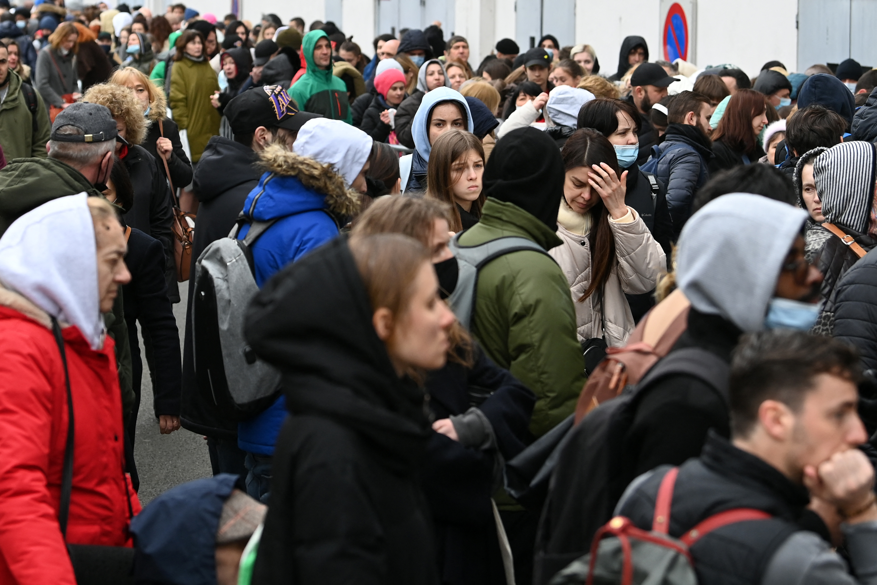 Ukrainians queue outside a refugee welcome center in Paris, France, on March 17.