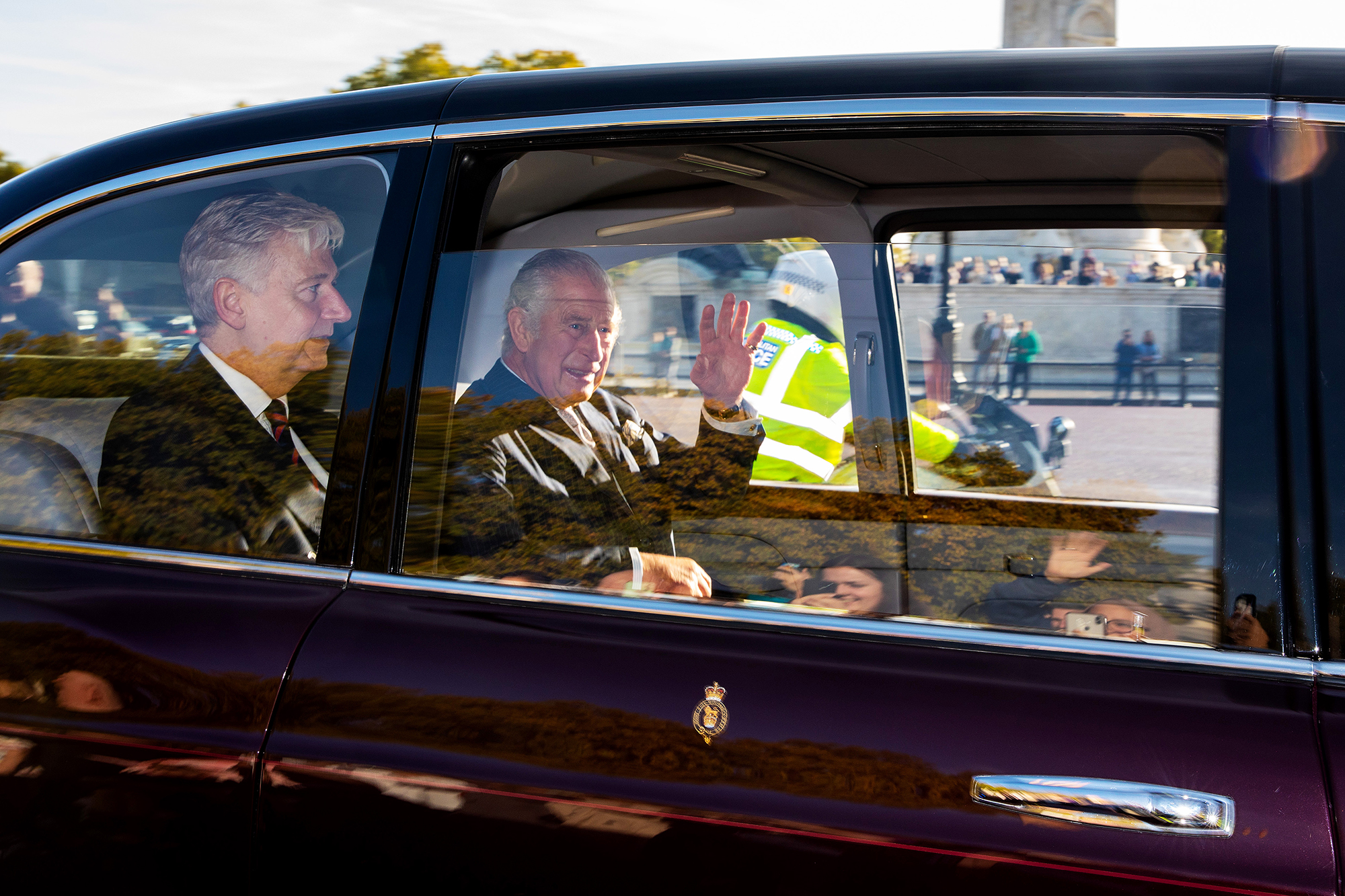 King Charles III arrives at Buckingham Palace ahead of his audiences with outgoing British Prime Minister Liz Truss and incoming leader Rishi Sunak on Tuesday.