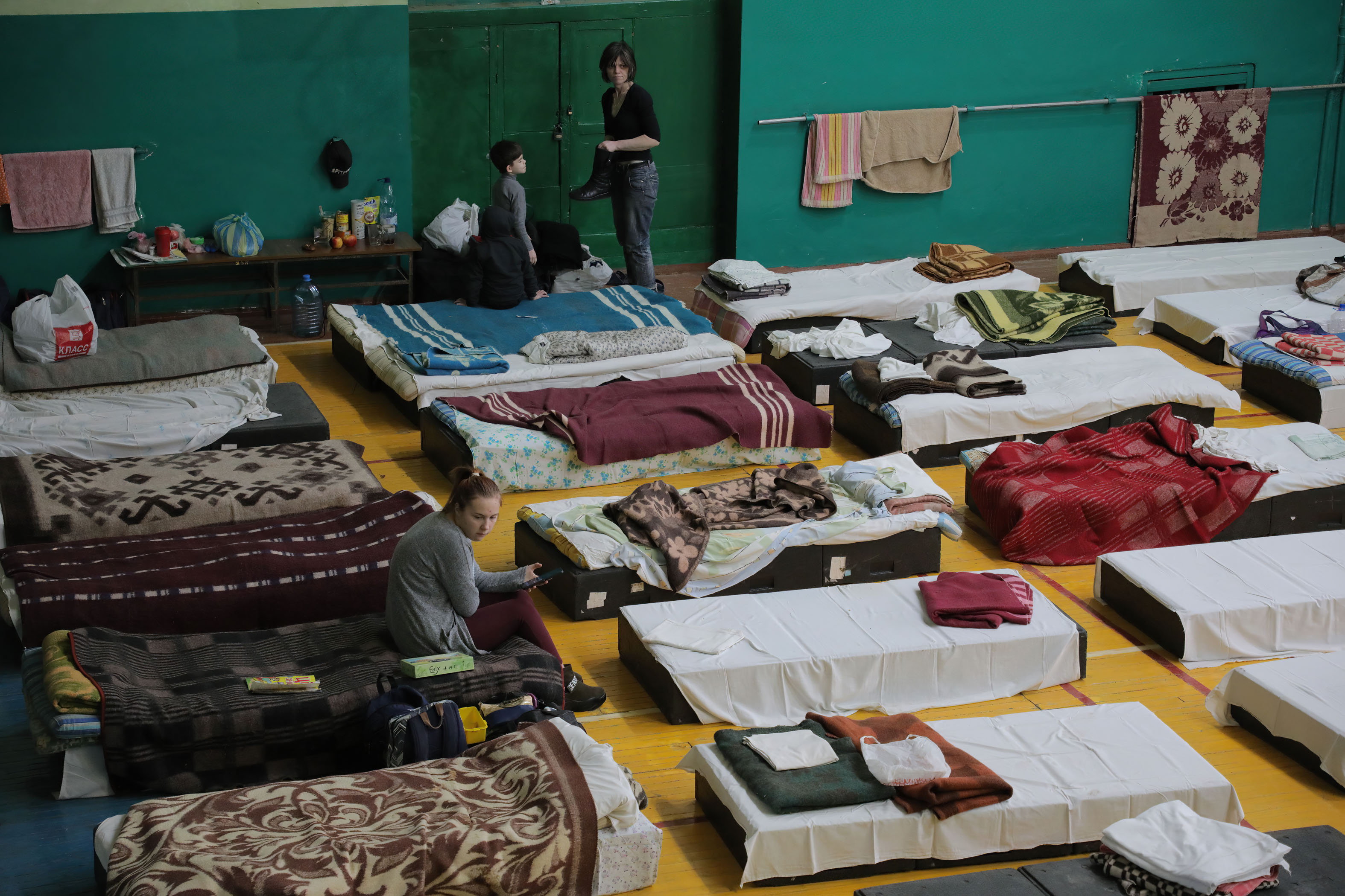 Beds seen in a gym where internally displaced persons are placed in Lviv, Ukraine, on March 7.