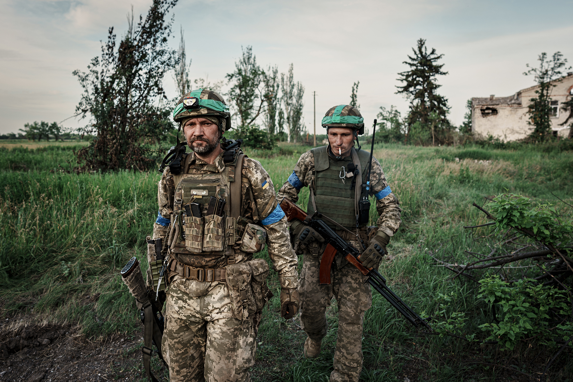 Soldiers of the 68th Jaeger Brigade walk in the newly liberated village of Blahodatne, Ukraine on June 10. The village is located on the border between Donetsk and Zaporizhzhia Oblasts. 