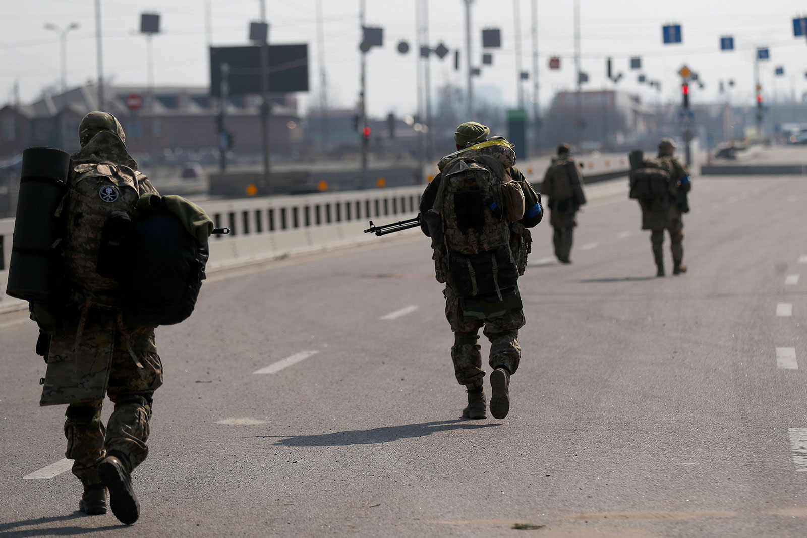 Ukrainian soldiers patrol on the outskirts of Kyiv on March 23. 