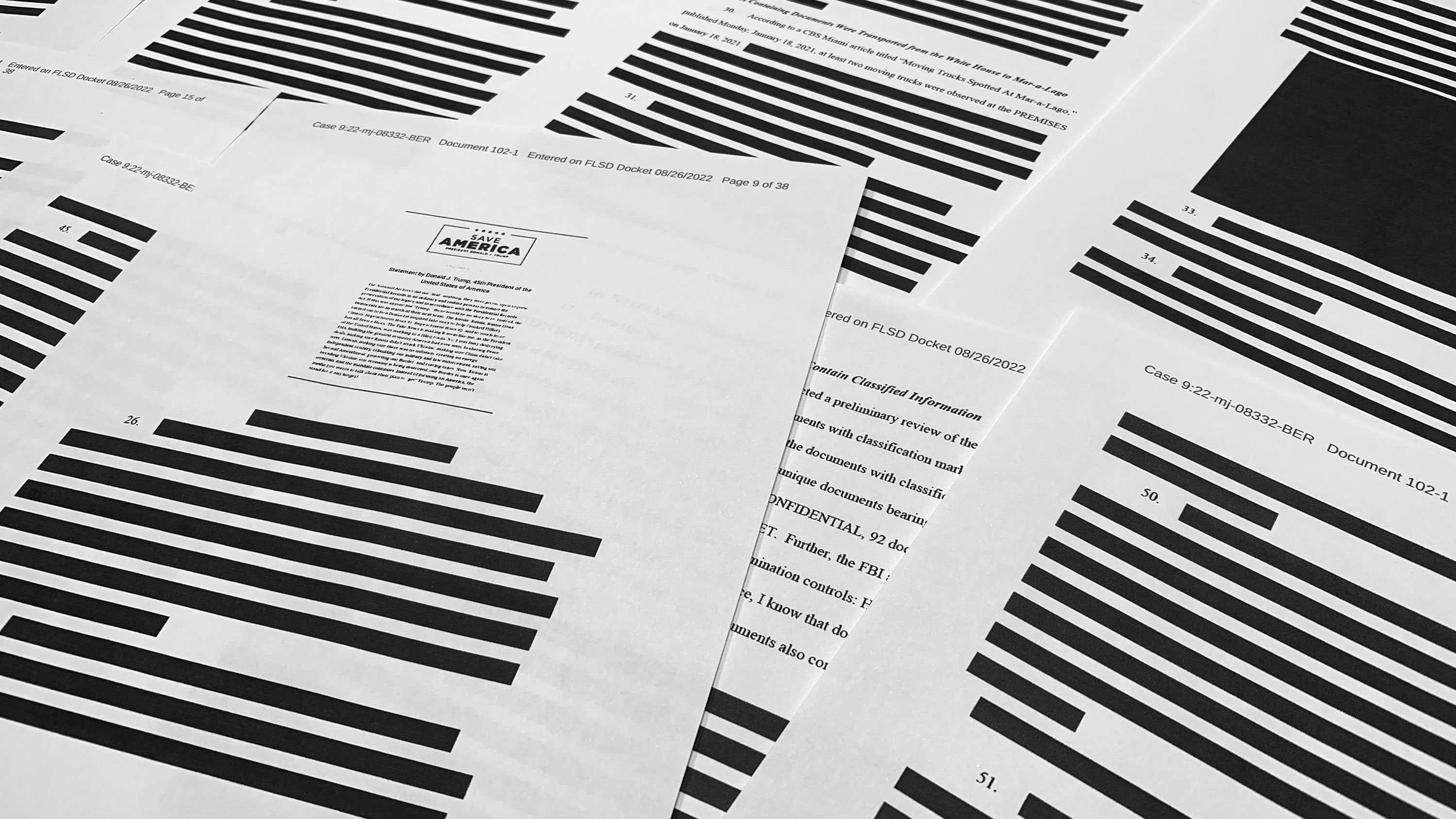 Pages from the affidavit by the FBI in support of obtaining a search warrant for former President Donald Trump's Mar-a-Lago estate are seen on Friday.