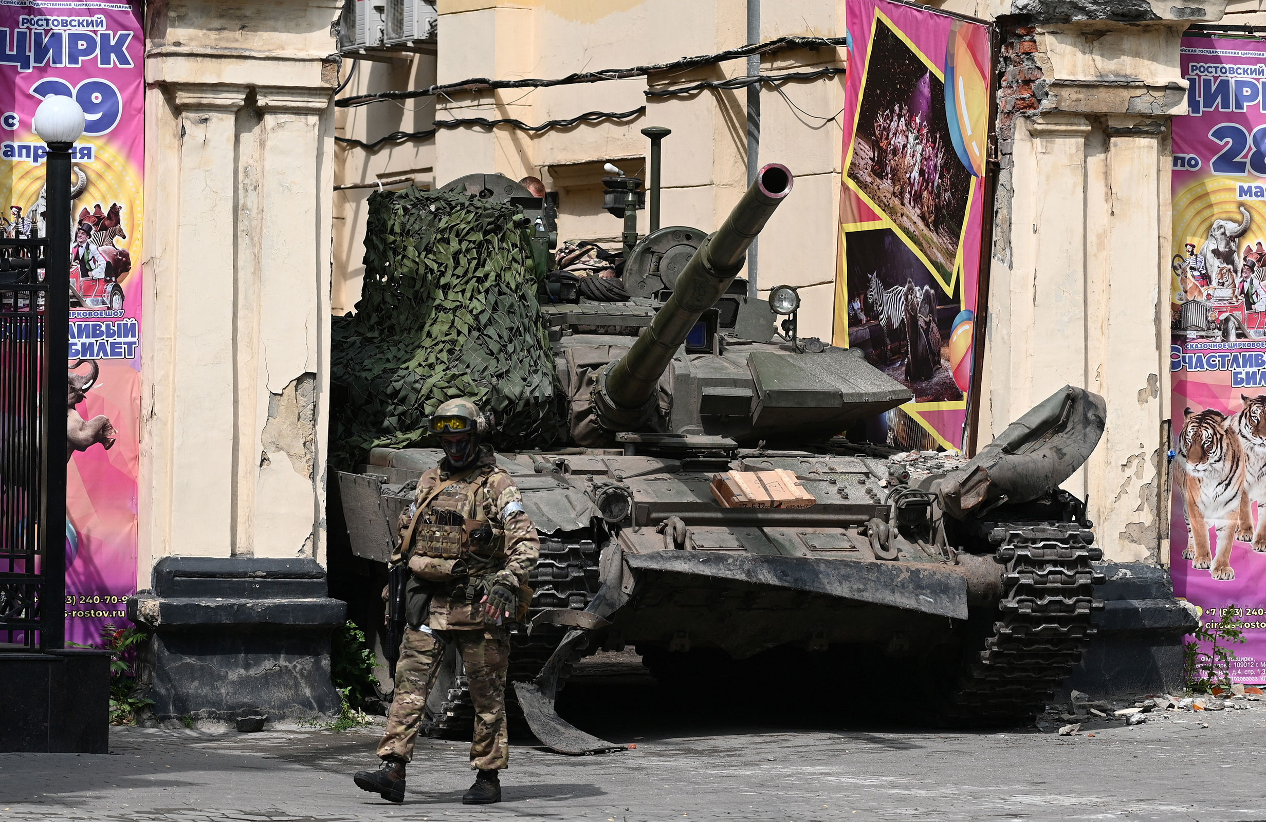 A Wagner fighter walks past a tank in Rostov-on-Don, Russia, on June 24. 