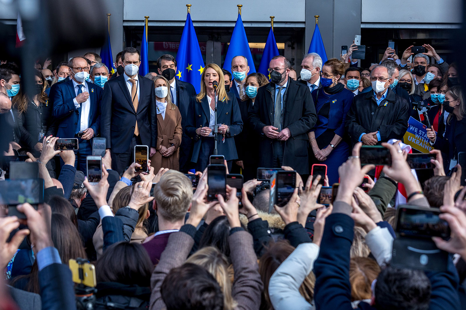 European Parliament President Roberta Metsola, center, speaks during a demonstration in front of the European Parliament in Brussels on March 1.