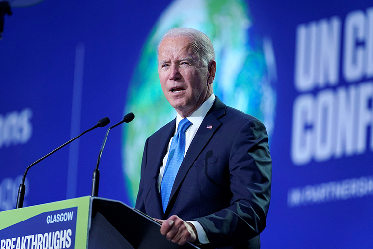 US President Joe Biden delivers a speech on stage during for a meeting, as part of the World Leaders' Summit of the COP26 UN Climate Change Conference in Glasgow, Scotland, on November 2, 2021. 