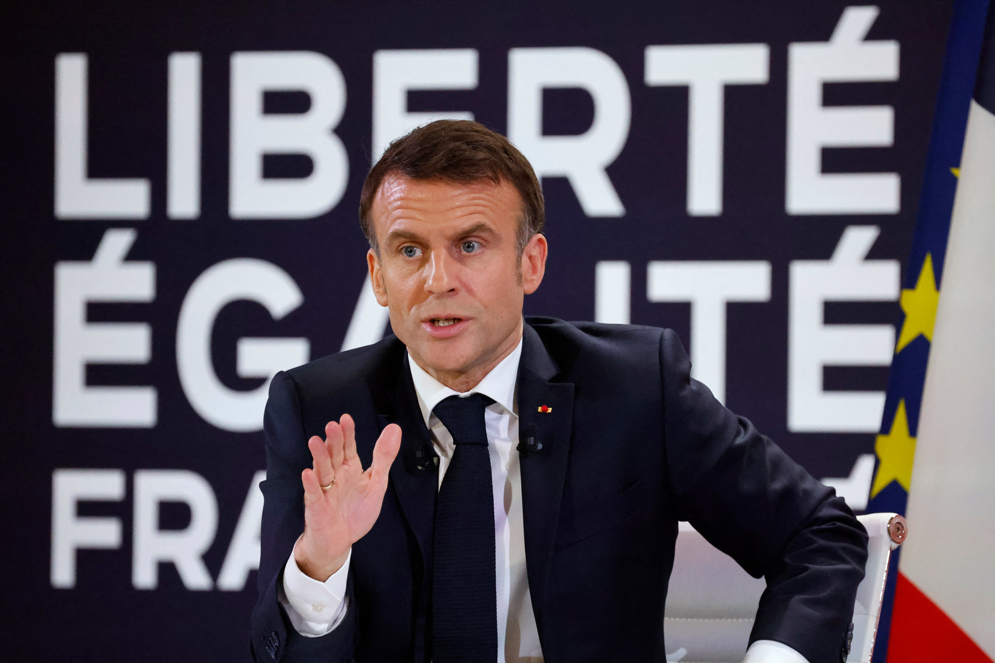 France's President Emmanuel Macron gestures as he speaks during a press conference to present the course for France's newly appointed government at The Elysee Palace in Paris, France, on January 16.