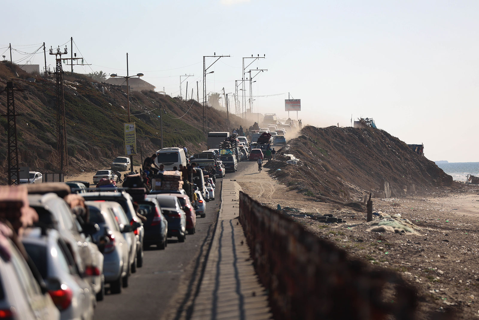 Displaced Palestinians evacuate from northern and central Gaza on Friday, October 13.