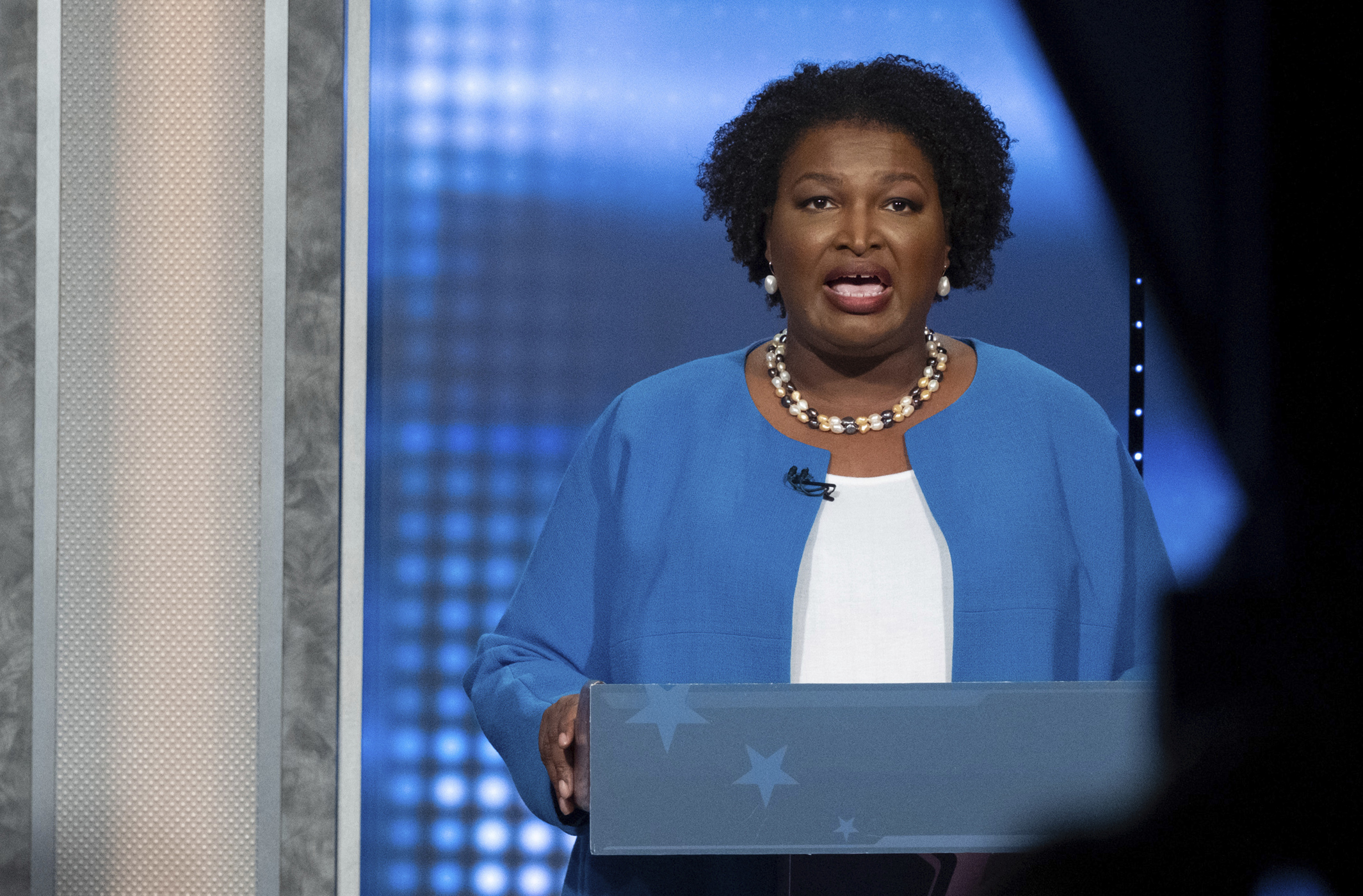 Democratic challenger Stacey Abrams speaks during the debate Sunday.