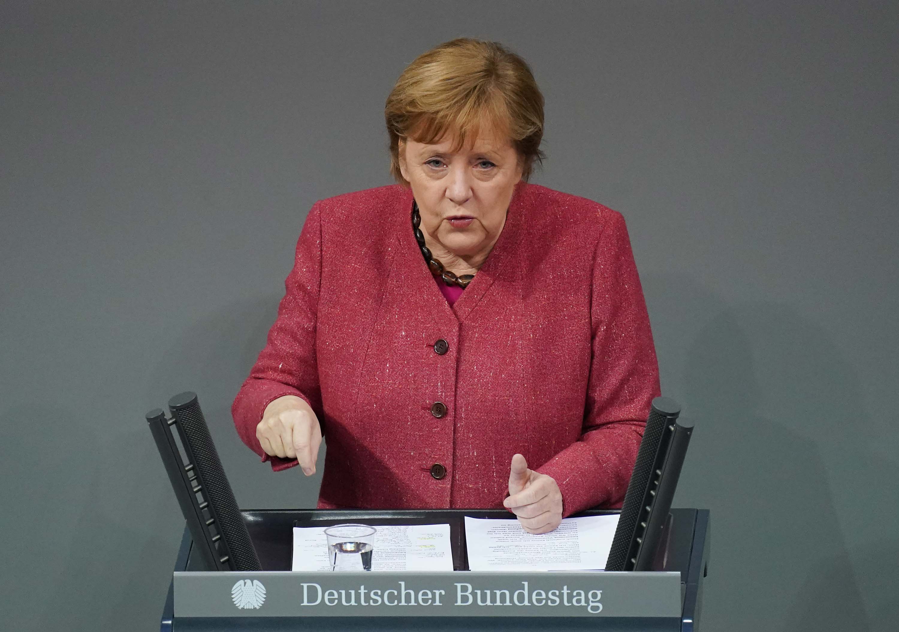 German Chancellor Angela Merkel speaks at the Bundestag in Berlin, Germany, on December 9.