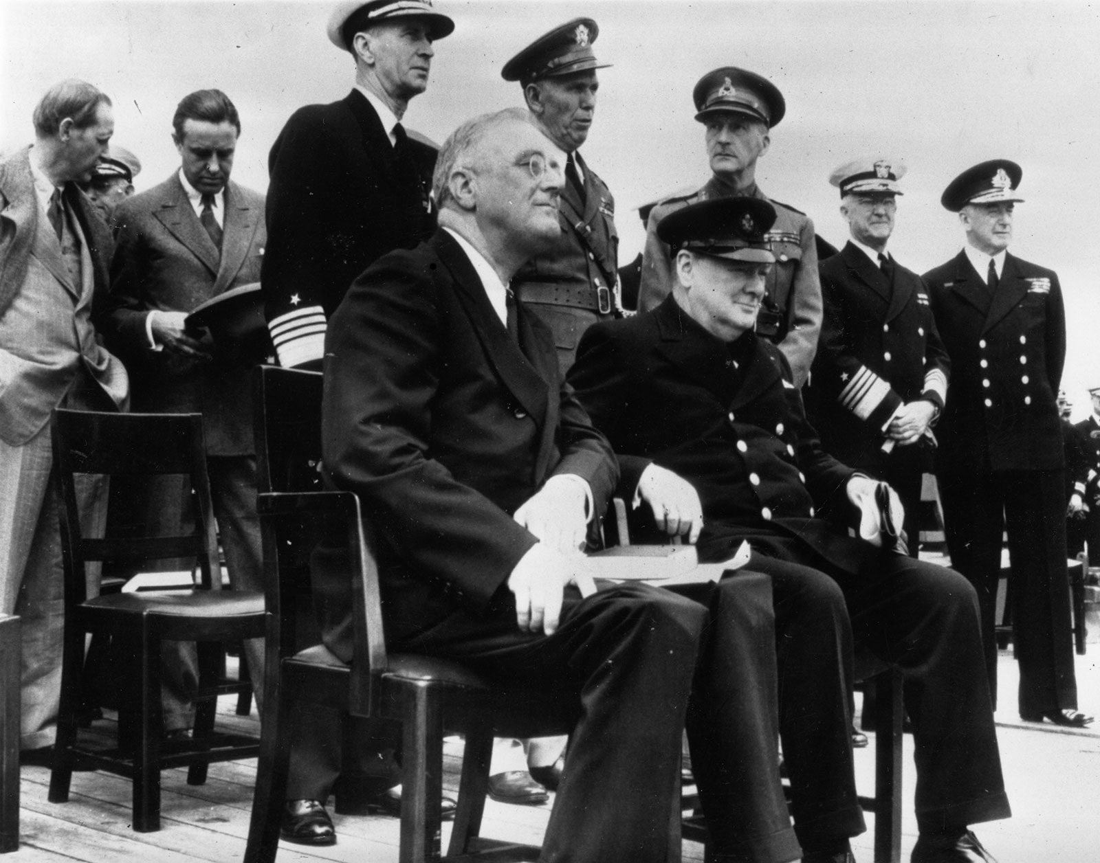 US President Franklin D. Roosevelt meets with UK Prime Minister Winston Churchill on board the HMS Prince of Wales in Placentia Bay, Newfoundland, in August 1941. 