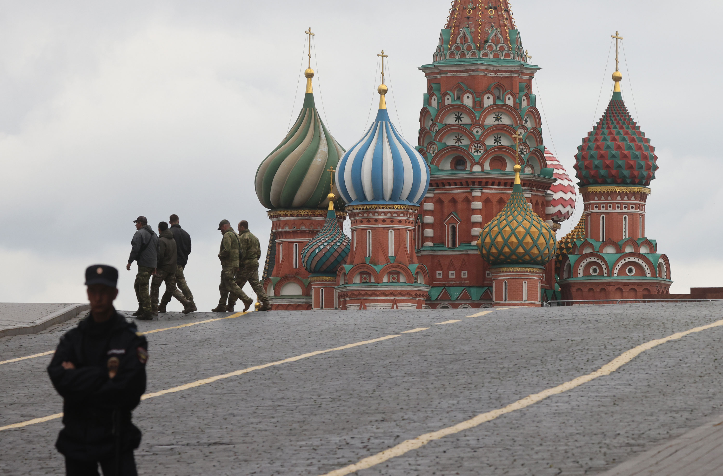A Russian Police officer guards the Red Square near the Kremlin in Moscow on Saturday.
