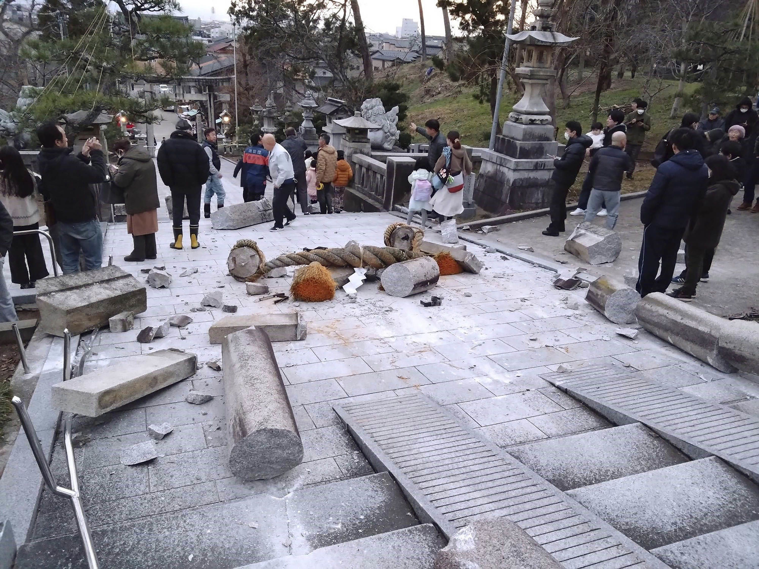 A torii gate is damaged after an earthquake at a shrine in Kanazawa, in Japan's Ishikawa prefecture, on January 1.
