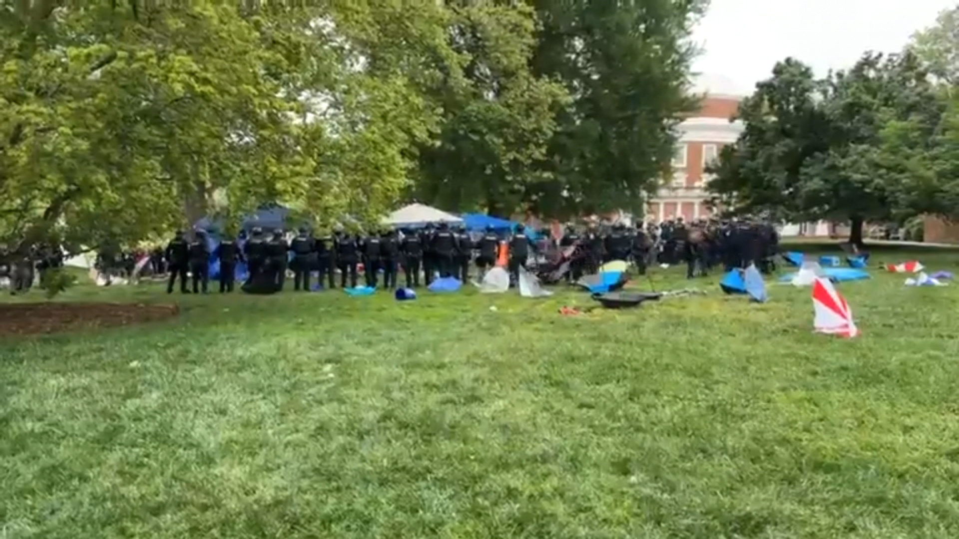 Police move toward people protesting in a pro-Palestinian encampment at the University of Virginia in Charlottesville on May 4.