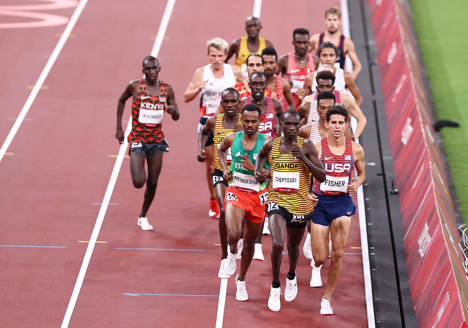 Joshua Cheptegei of Team Uganda leads the field in the men's 5000 meter final on August 6.