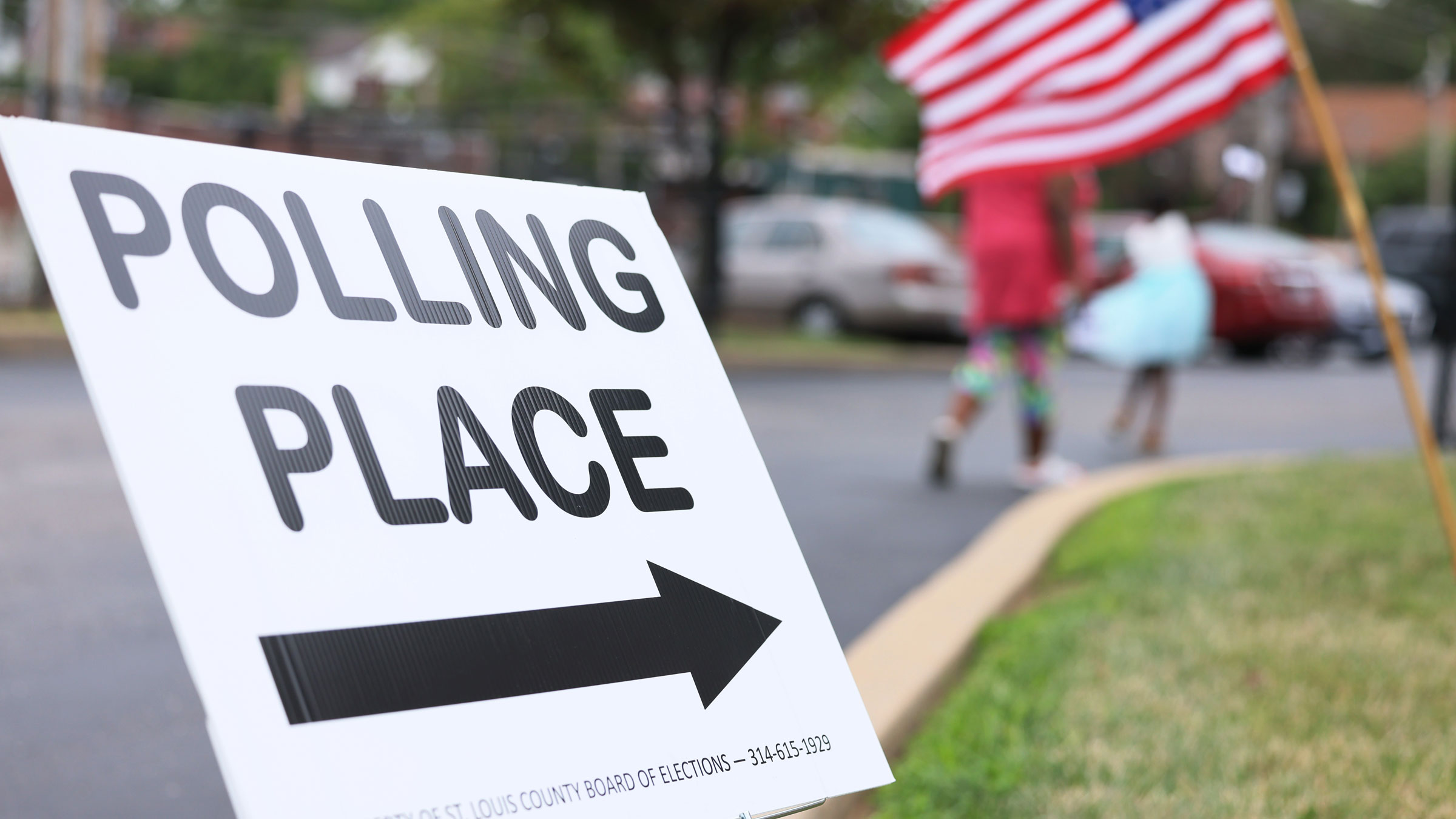 A sign guides voters to a polling place in St. Louis on Tuesday.