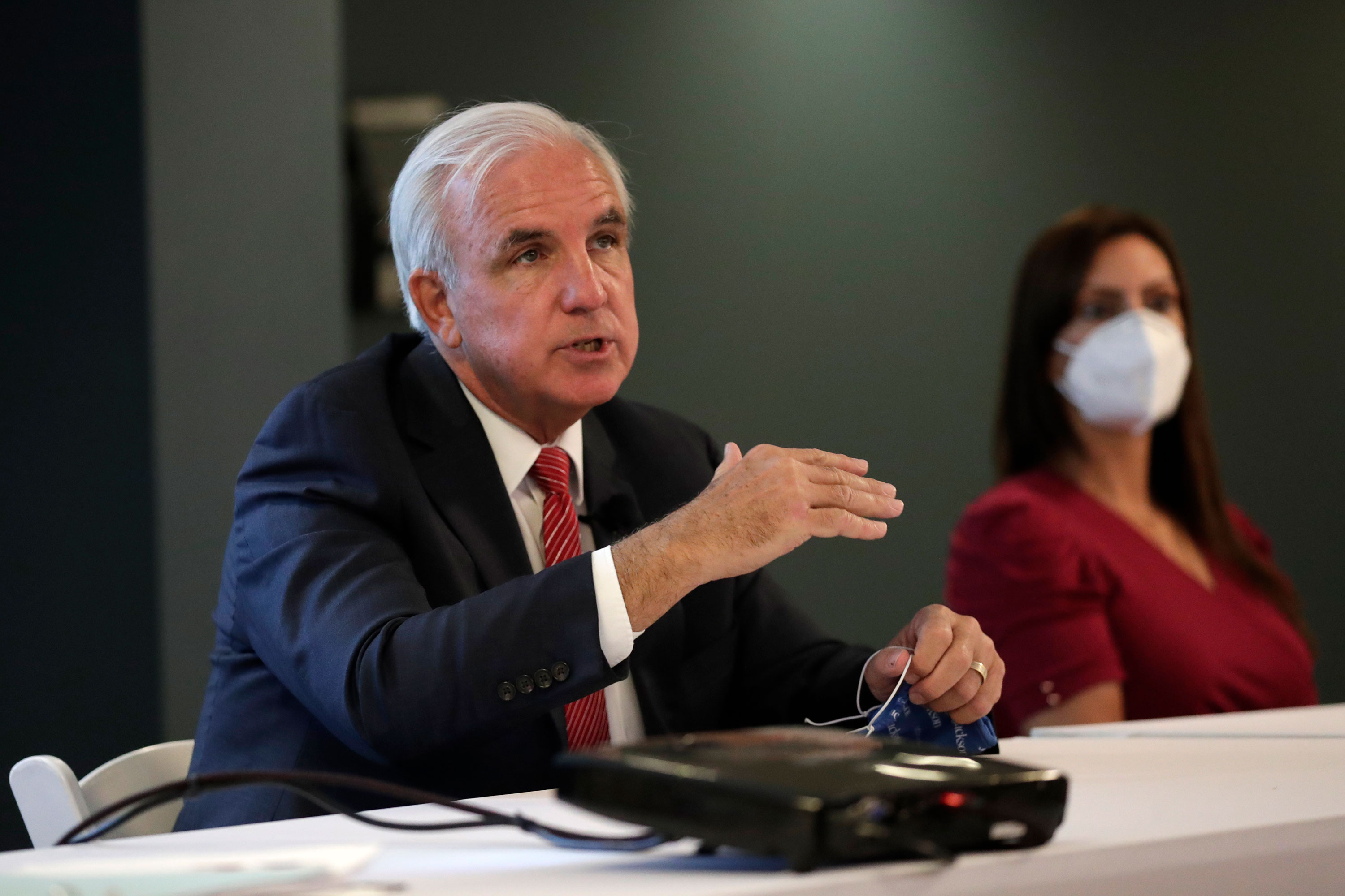 Miami-Dade County Mayor Carlos Gimenez speaks during a news conference on July 7.