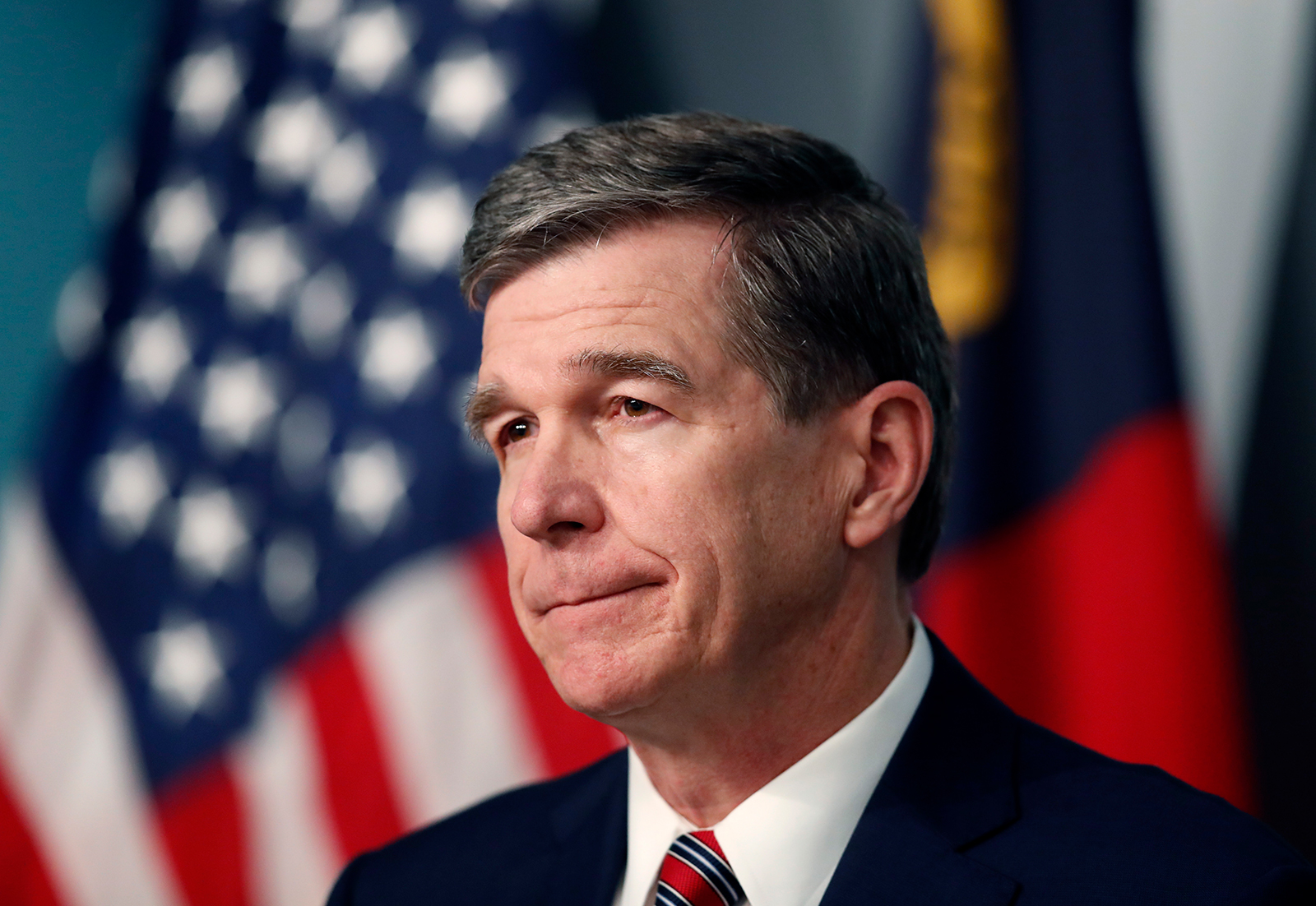 Gov. Roy Cooper listens to a question during a briefing on the coronavirus pandemic at the Emergency Operations Center in Raleigh, North Carolina, on May 26.