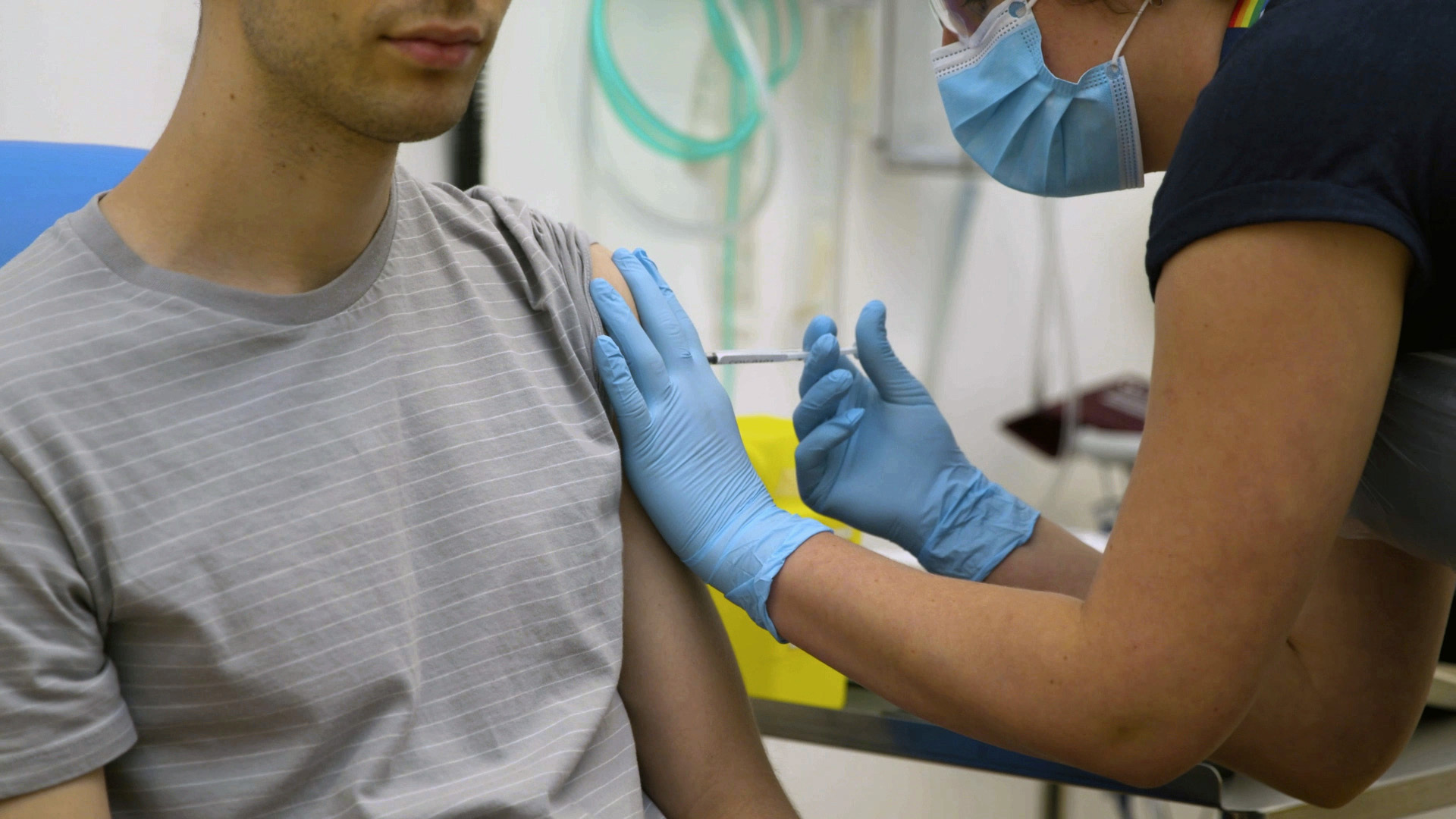 In this screen grab from video issued by Britain's Oxford University, a volunteer is injected with either an experimental COVID-19 vaccine or a comparison shot as part of the first human trials in the United Kingdom to test a potential vaccine, led by Oxford University in England on April 25. 